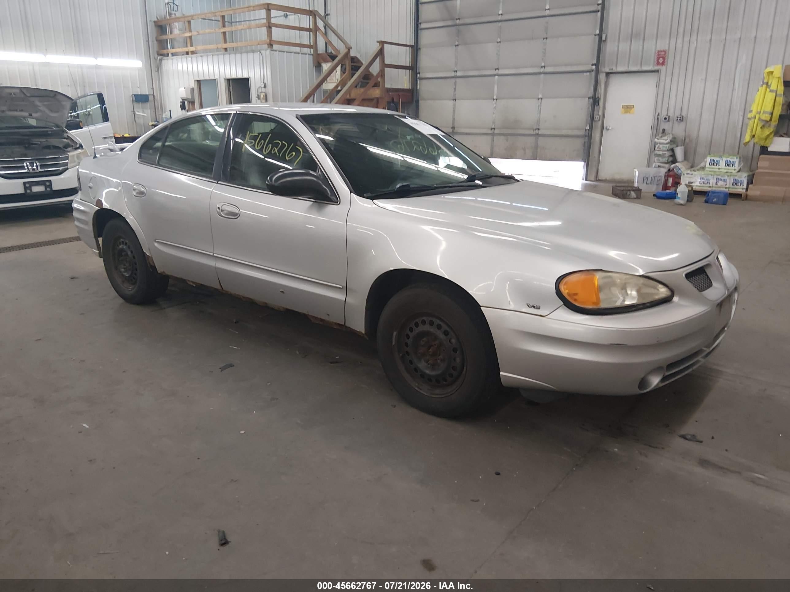 2005 Pontiac Grand Am SE, VIN 1G2NE52E25M134607 — Side