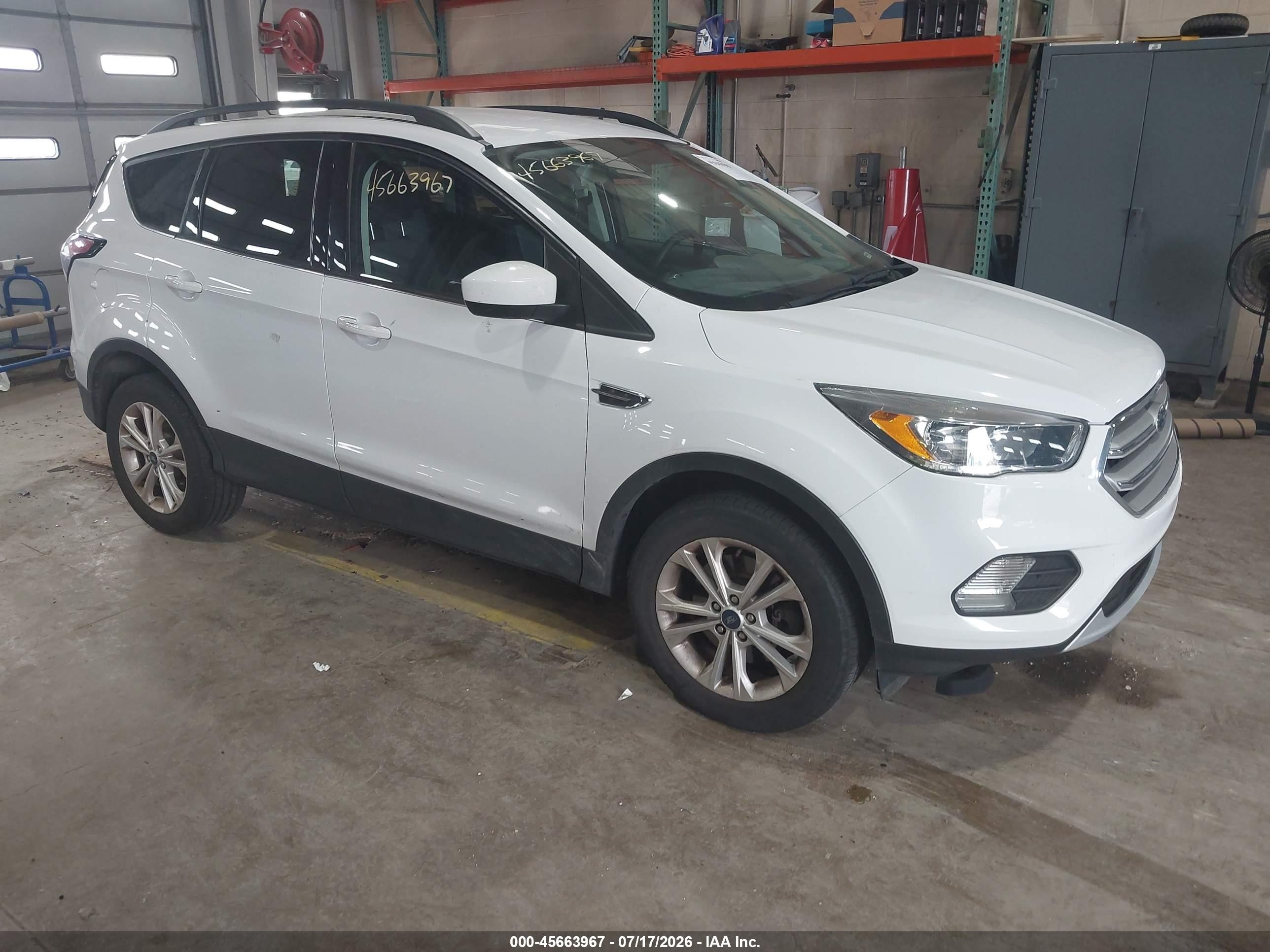 2018 Ford Escape SE, VIN 1FMCU9GD9JUD19594 — Side