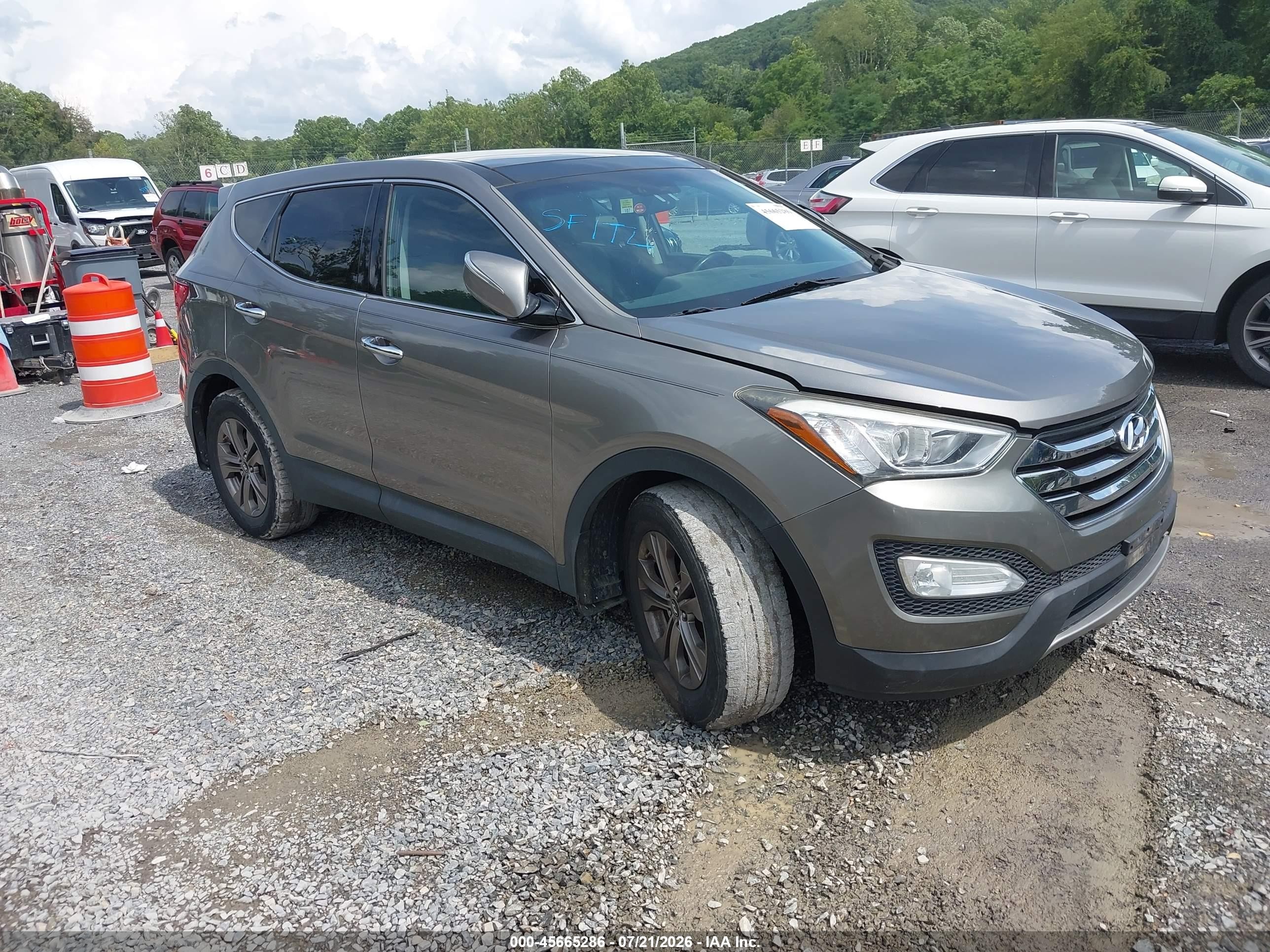2013 Hyundai Santa Fe Sport, VIN 5XYZUDLB8DG119298 — Rear end