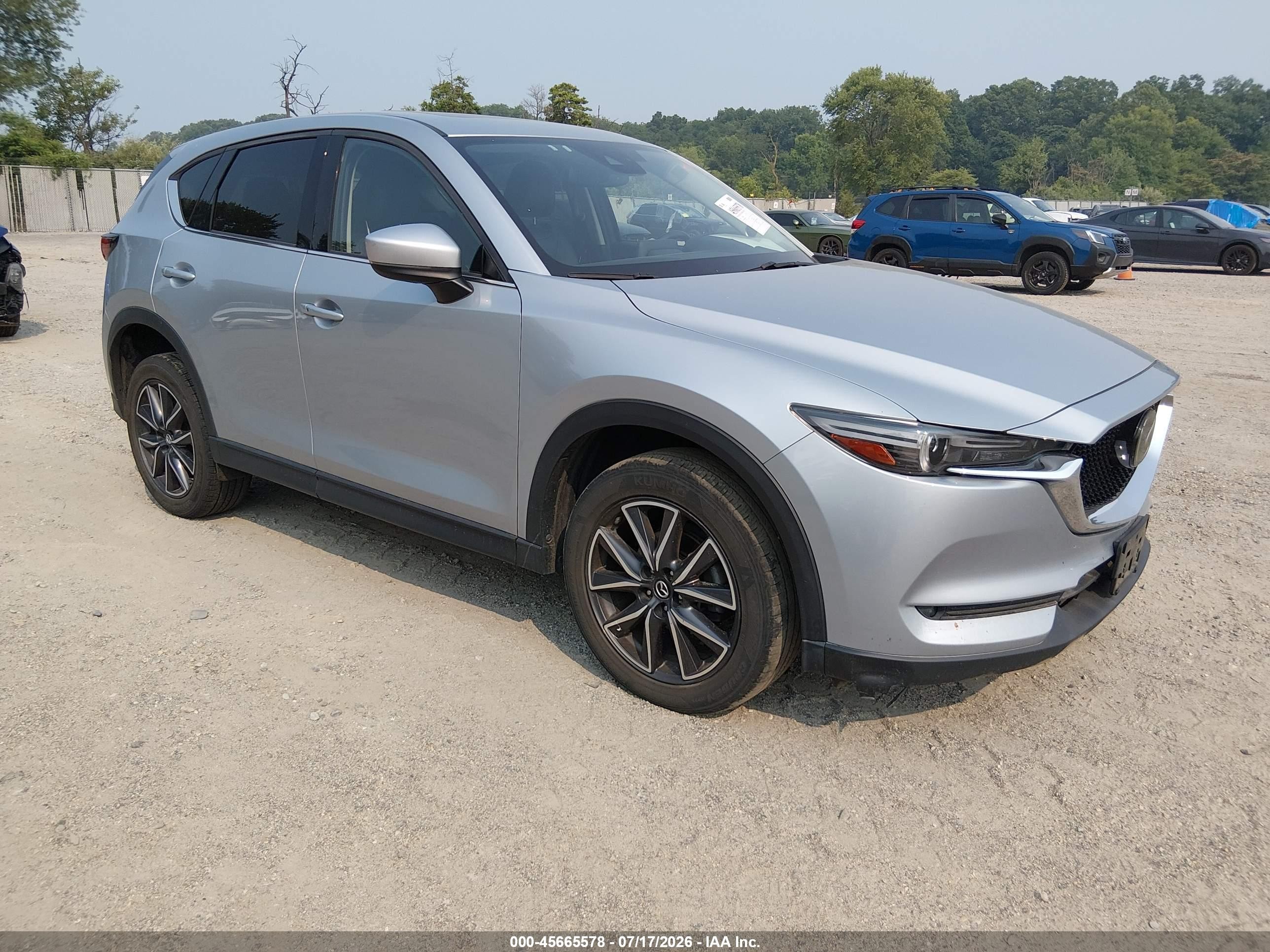 2017 Mazda CX-5 Grand Touring, VIN JM3KFBDL8H0102236 — Вода / потоп