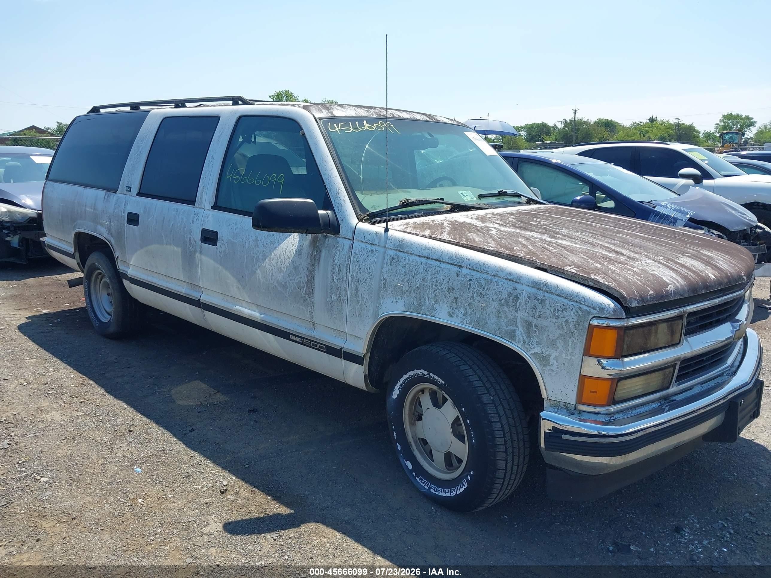 1997 GMC Suburban, VIN 3GKEC16RXVG512073 — Normal wear