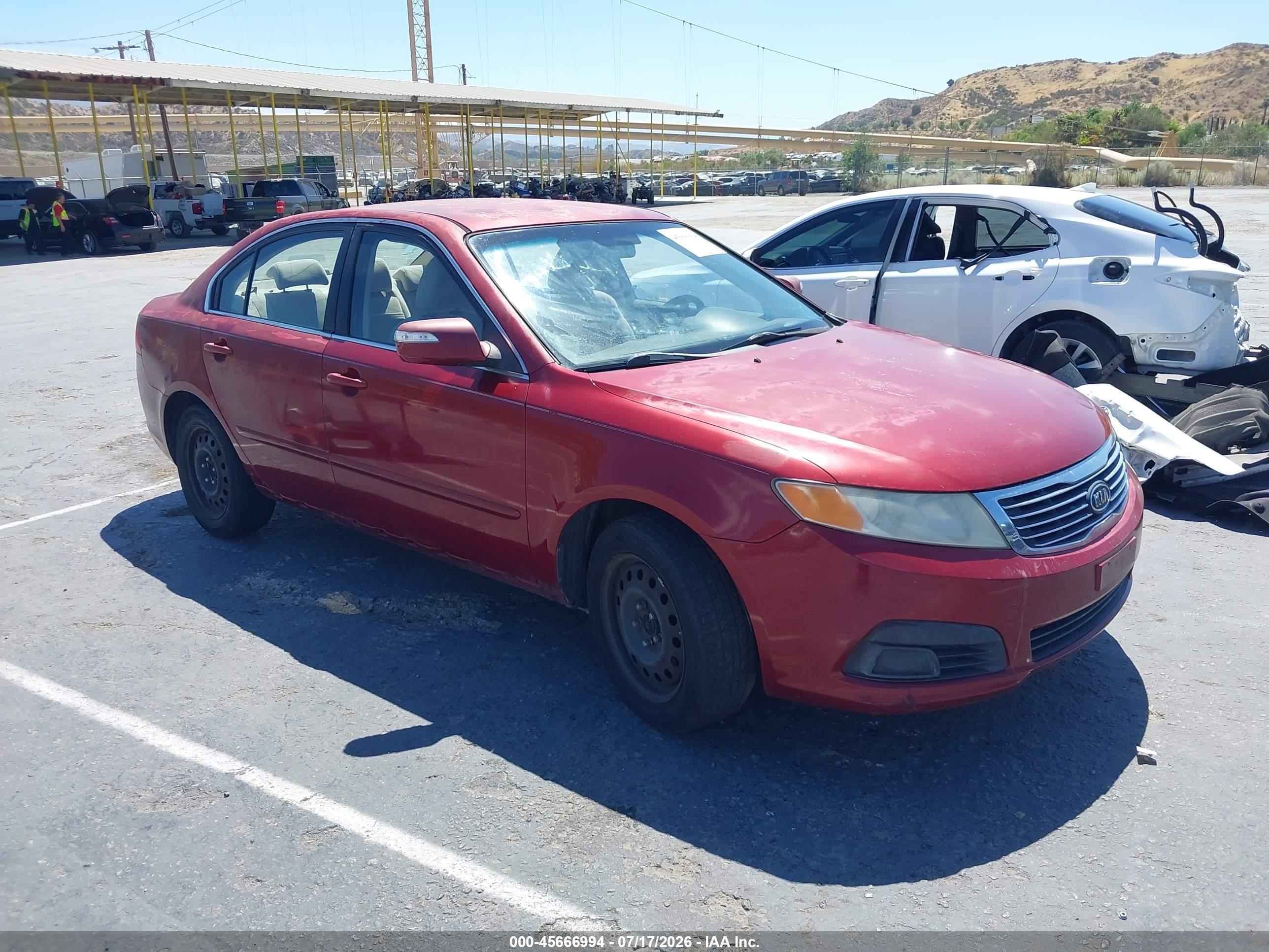 2009 Kia Optima LX, VIN KNAGE228X95359268 — Зад
