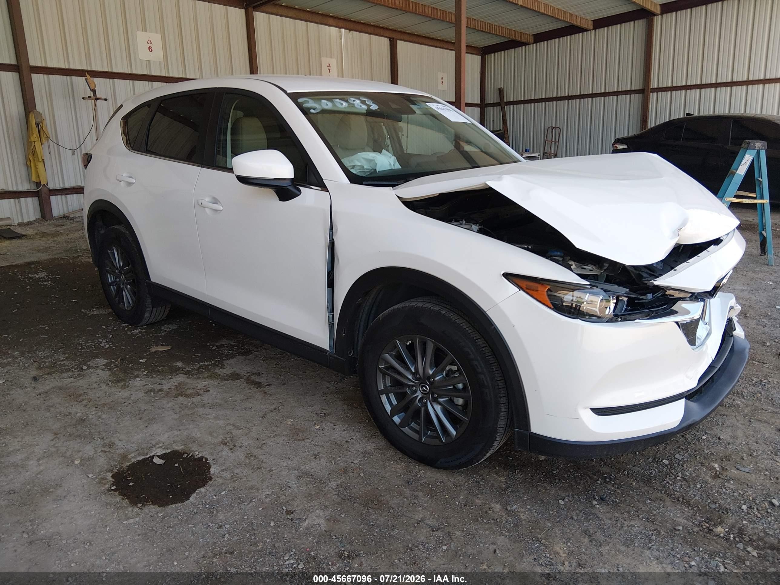 2017 Mazda CX-5 Touring, VIN JM3KFACL5H0187810 — Перед