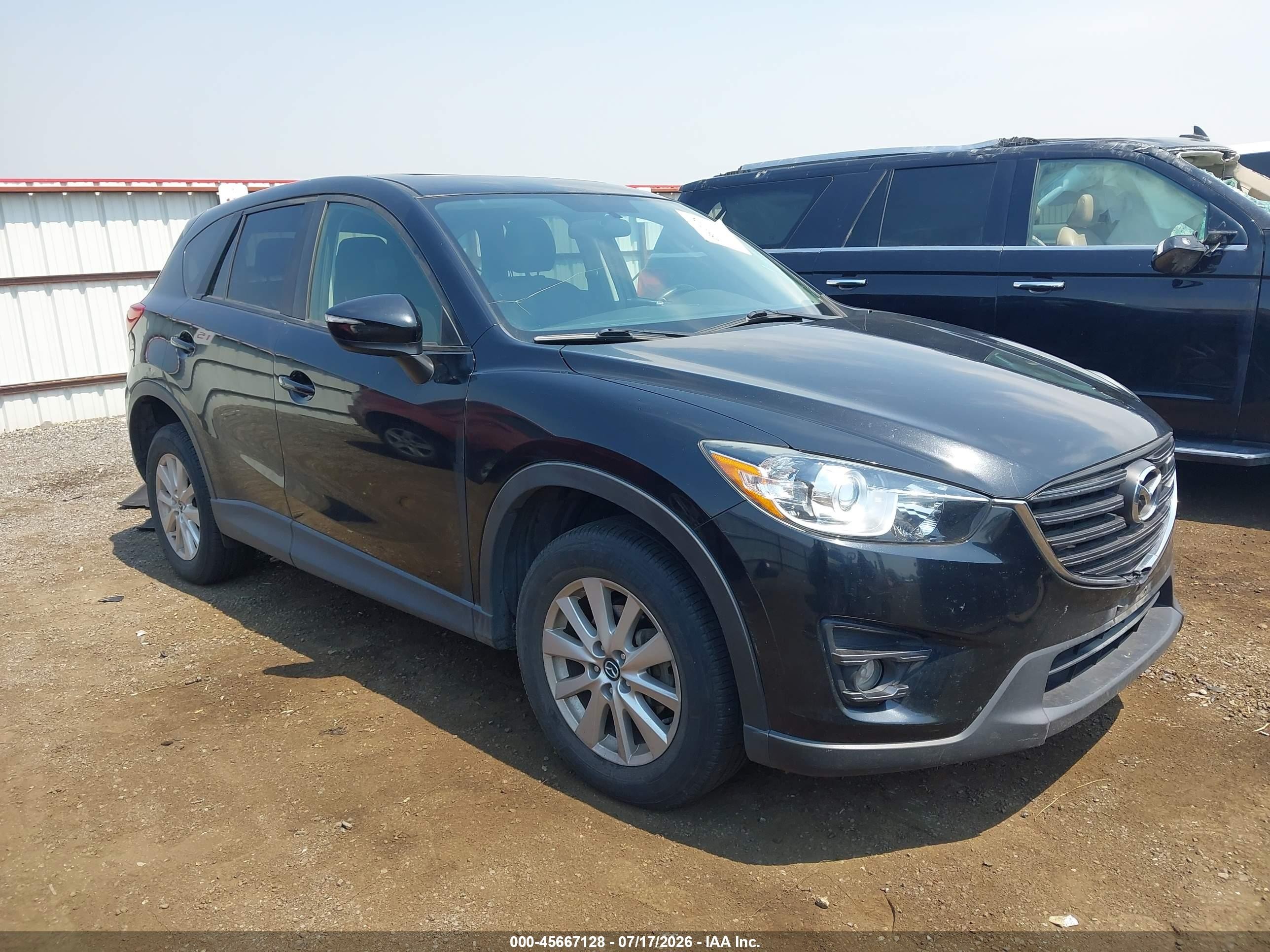 2016 Mazda CX-5 Touring, VIN JM3KE4CY7G0885219 — Normal wear