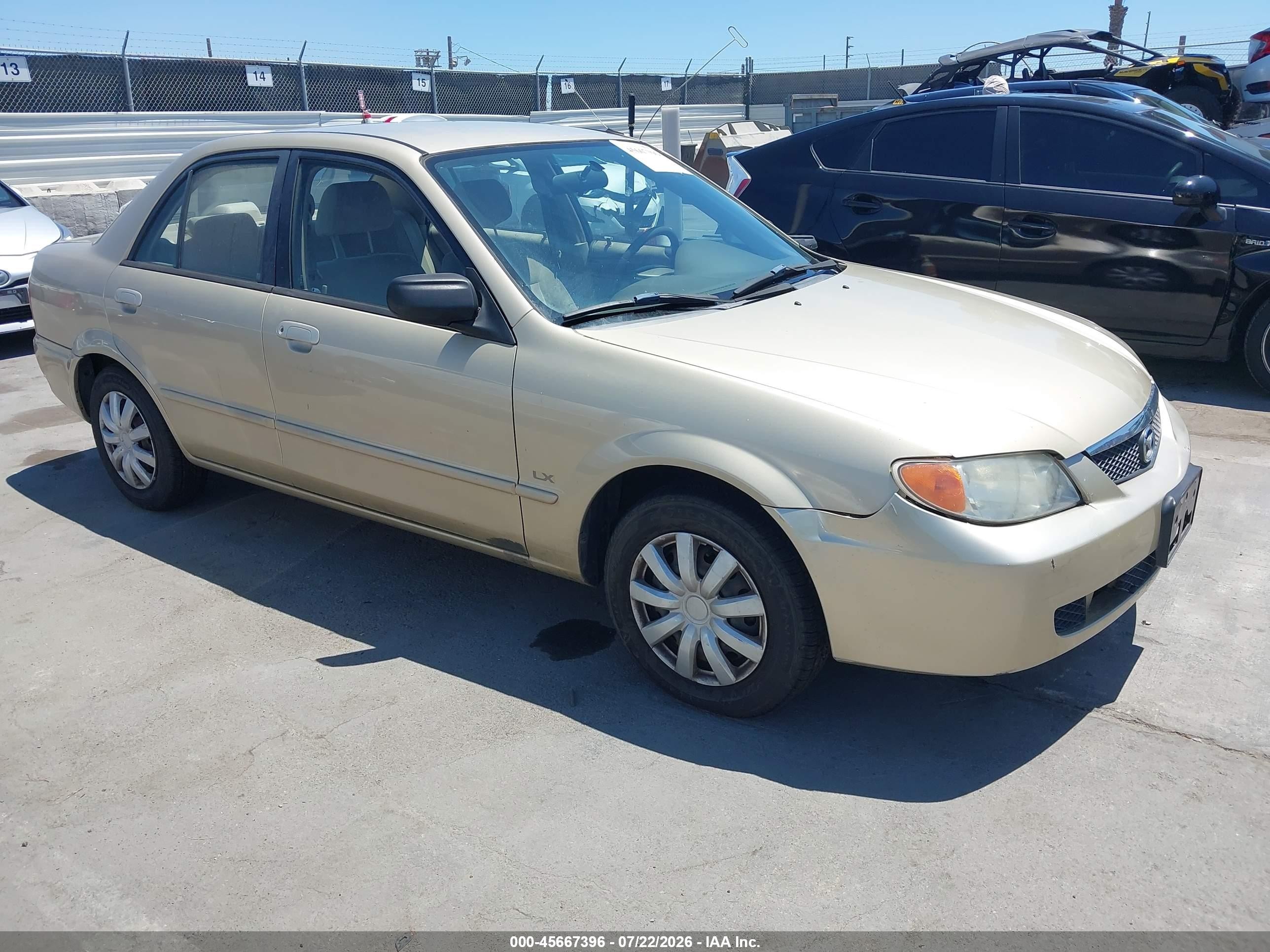 2001 Mazda Protege DX, VIN JM1BJ222110424014 — Normal wear