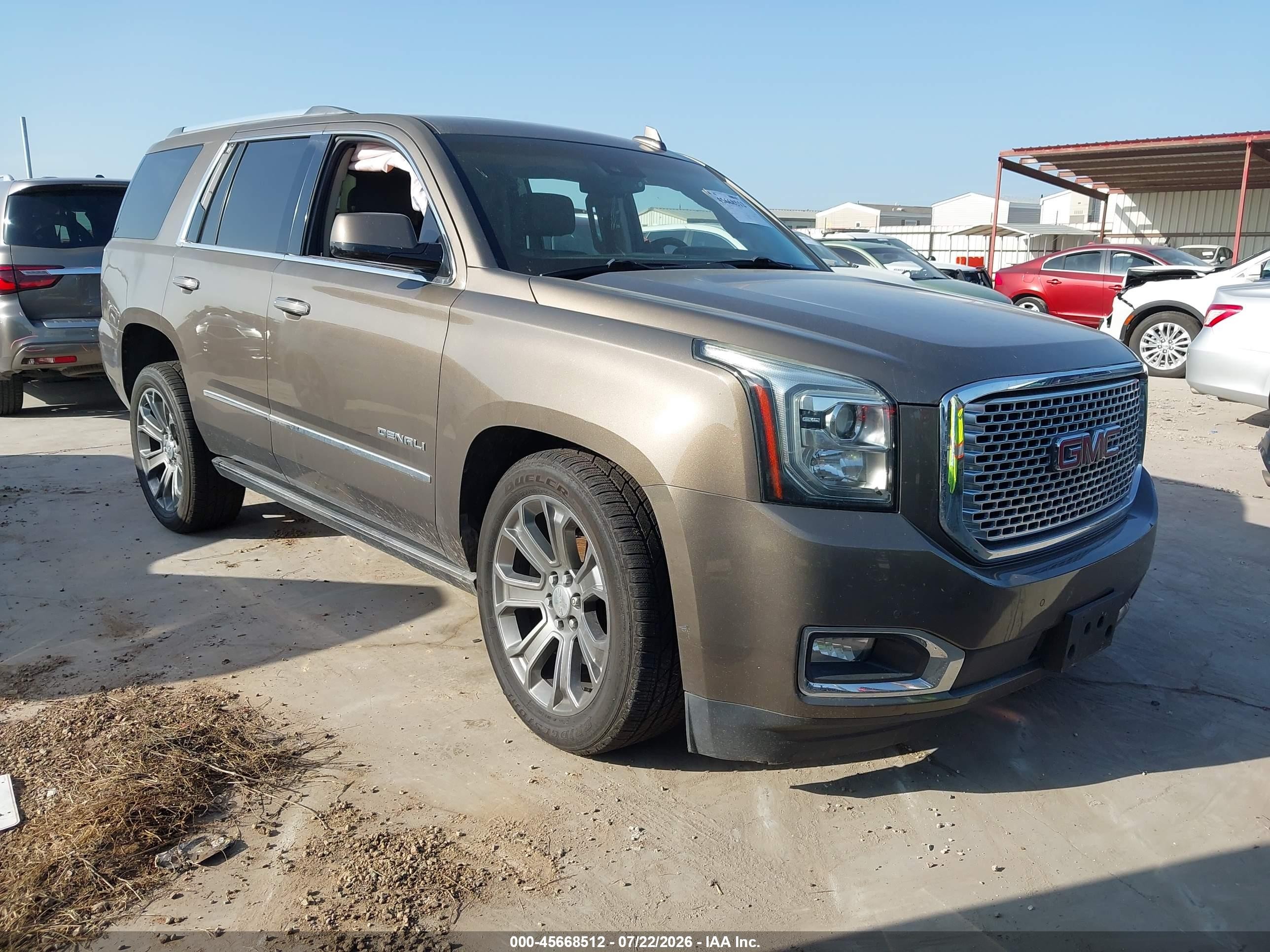 2015 GMC Yukon Denali, VIN 1GKS1CKJ1FR590652 — Side