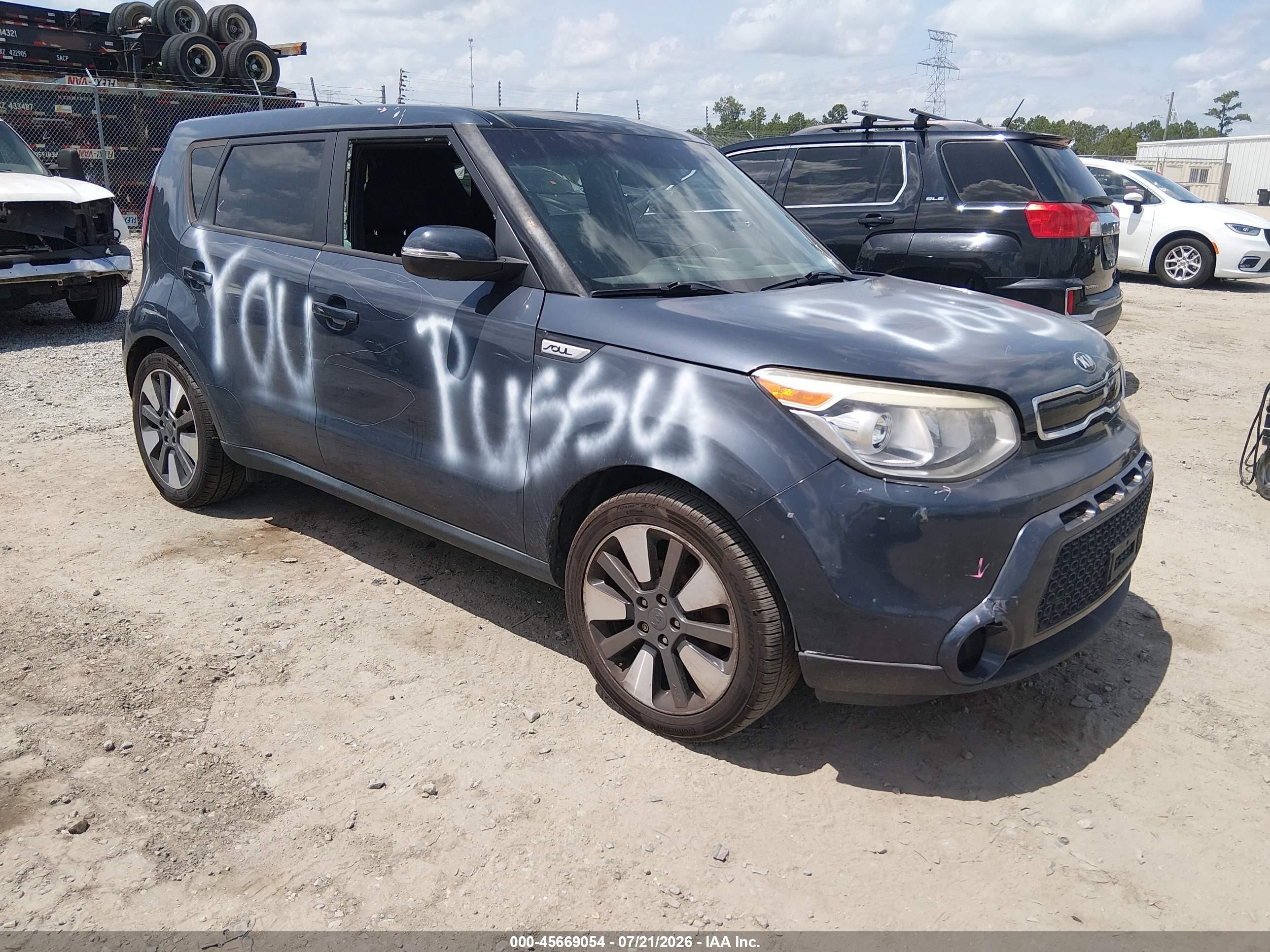 2014 Kia Soul +, VIN KNDJX3A58E7009409 — Side