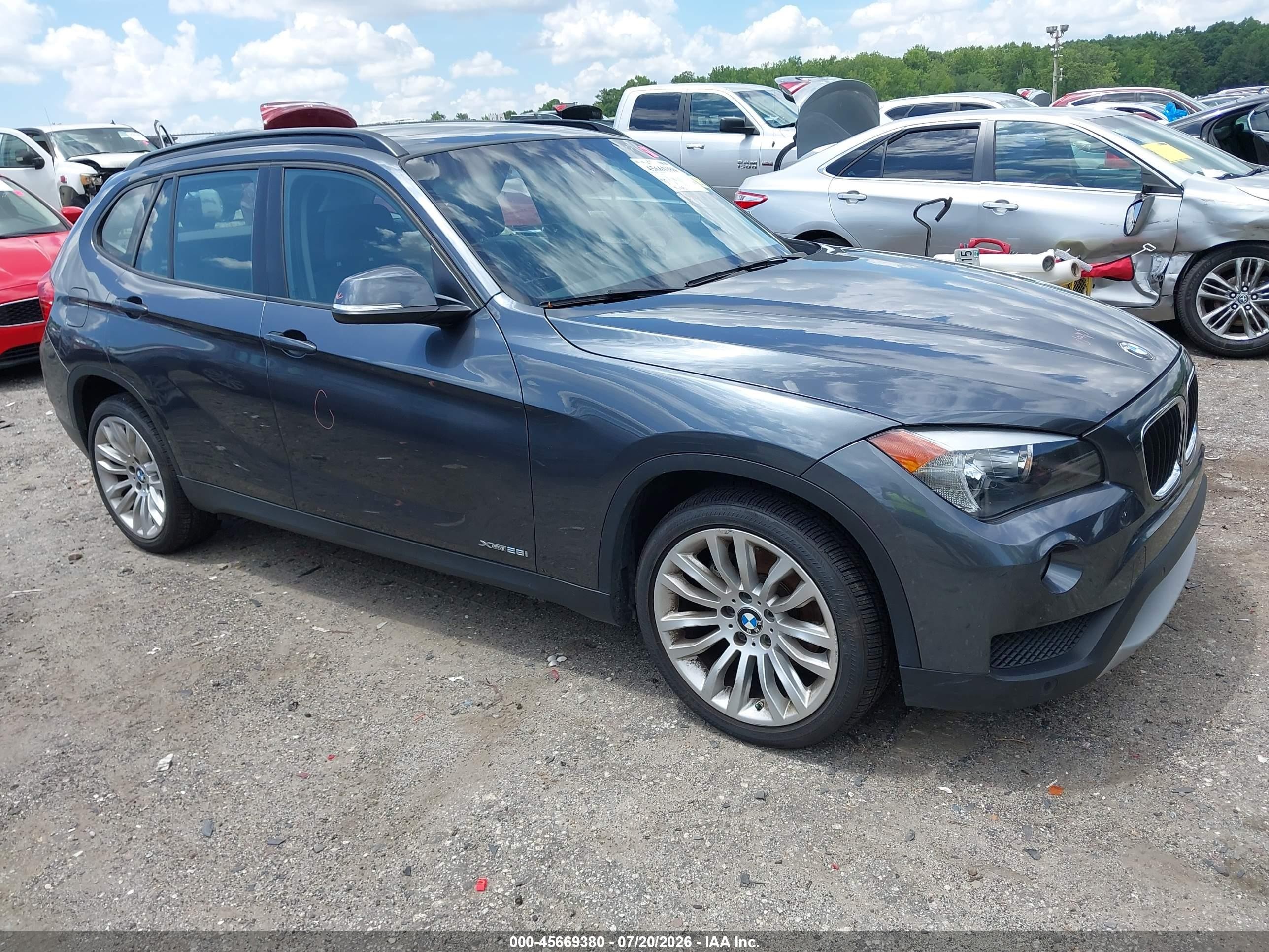2014 BMW X1 xDrive28i, VIN WBAVL1C56EVY18754 — Rear end