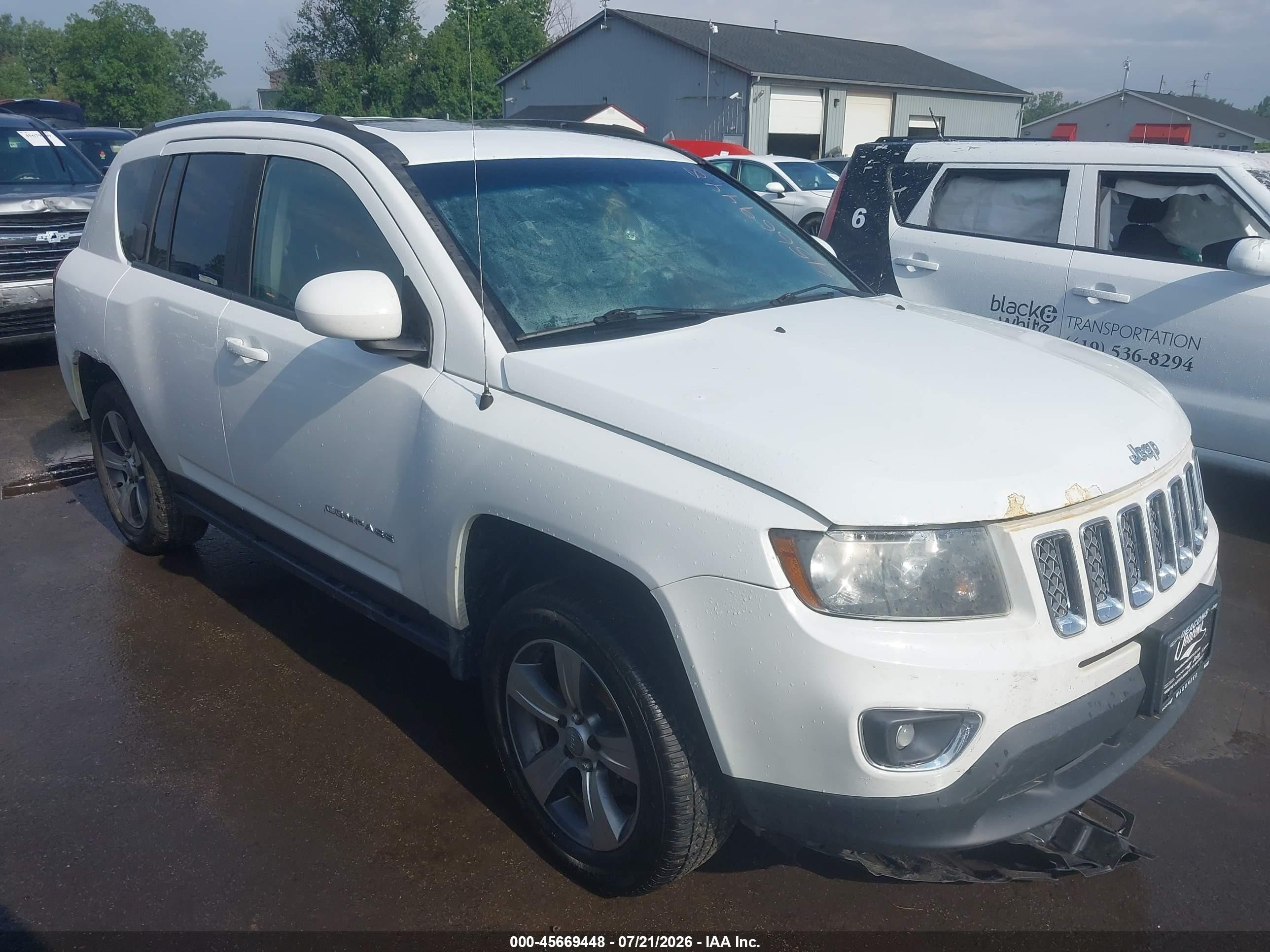 2016 Jeep Compass High Altitude, VIN 1C4NJDEB0GD664077 — Water / flood