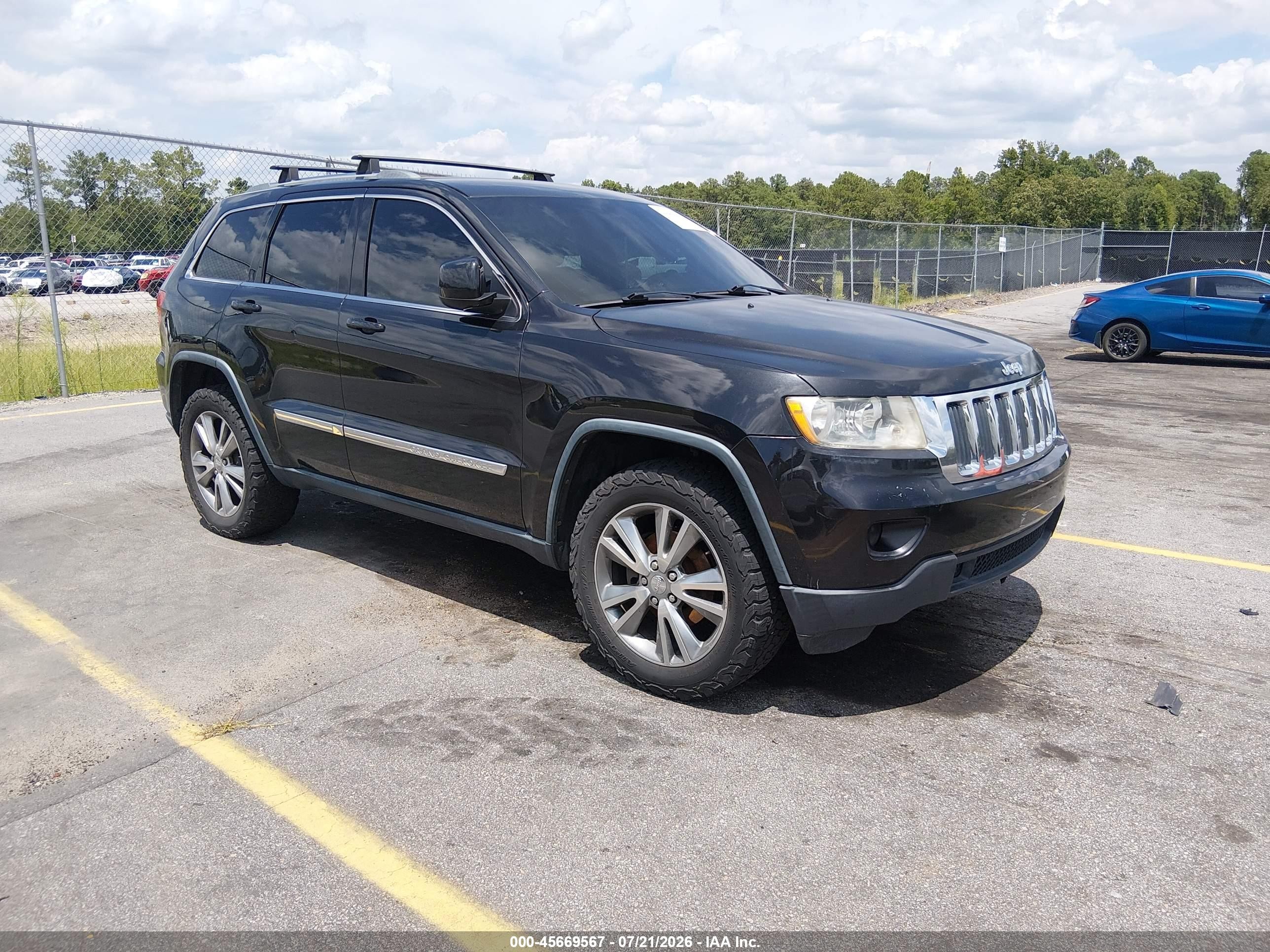 2013 Jeep Grand Cherokee Laredo, VIN 1C4RJEAG4DC534345 — Normal wear