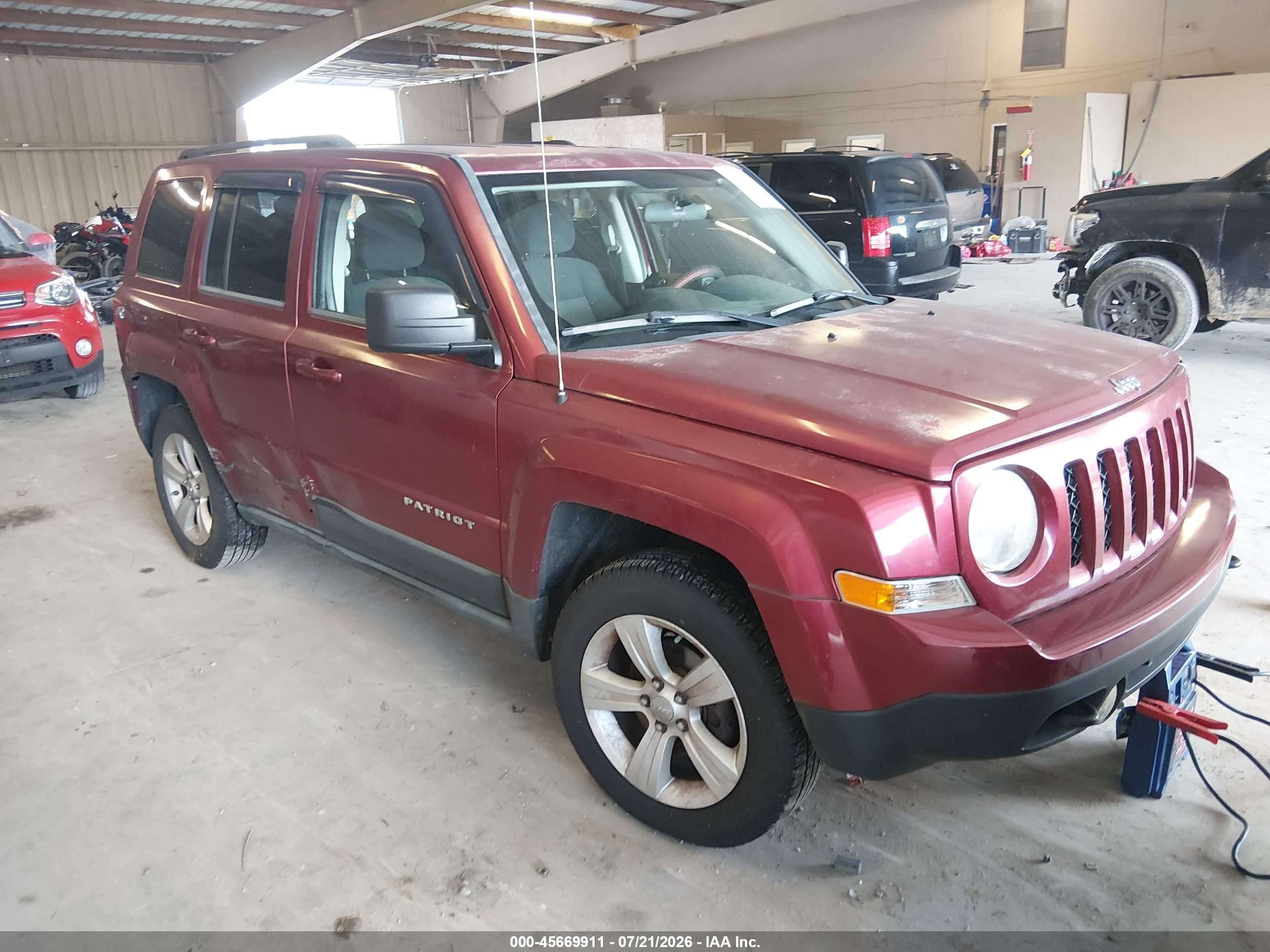 2011 Jeep Patriot Sport, VIN 1J4NF1GB2BD187961 — Side