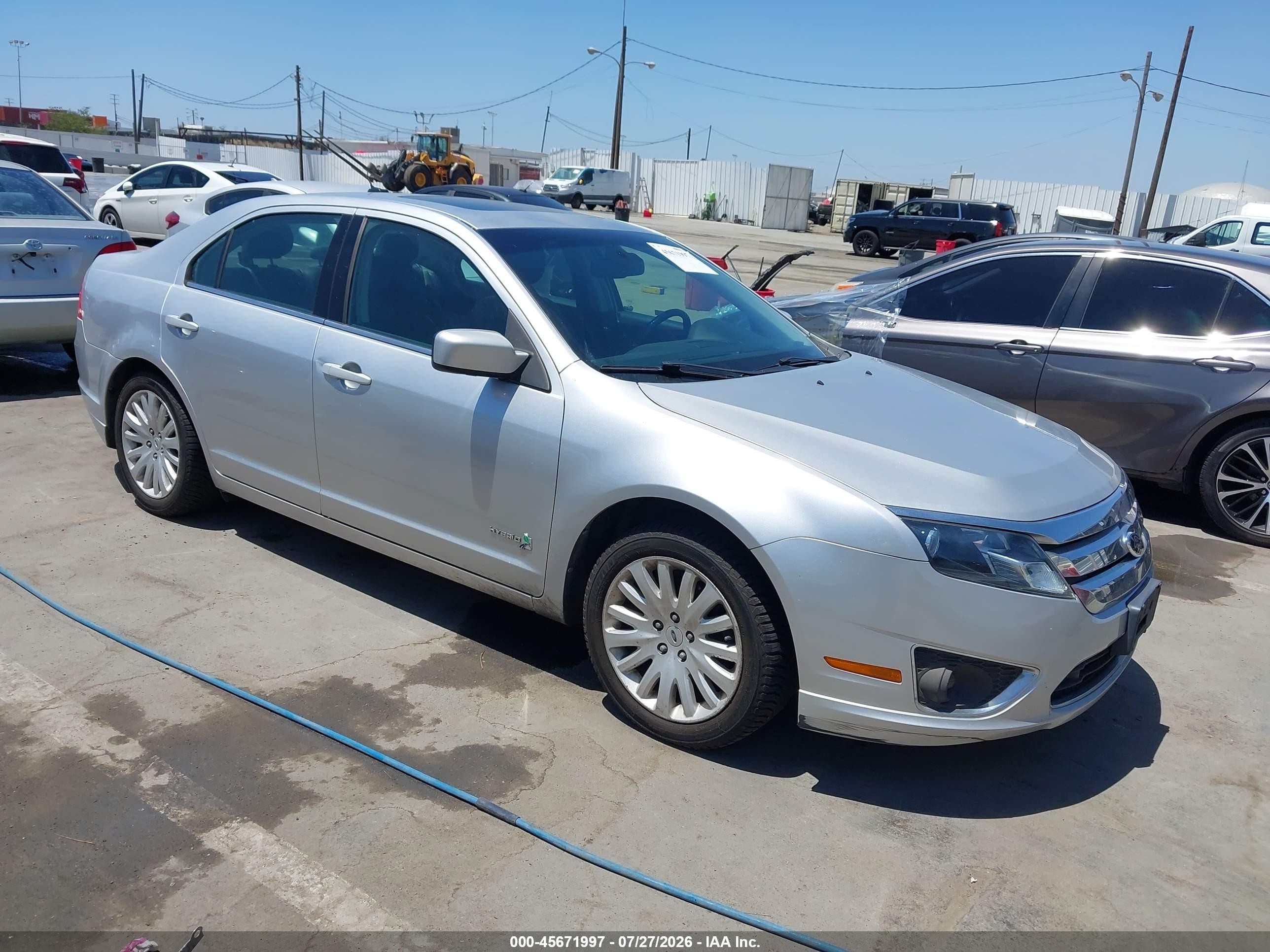 2011 Ford Fusion Hybrid, VIN 3FADP0L30BR319555 — Side