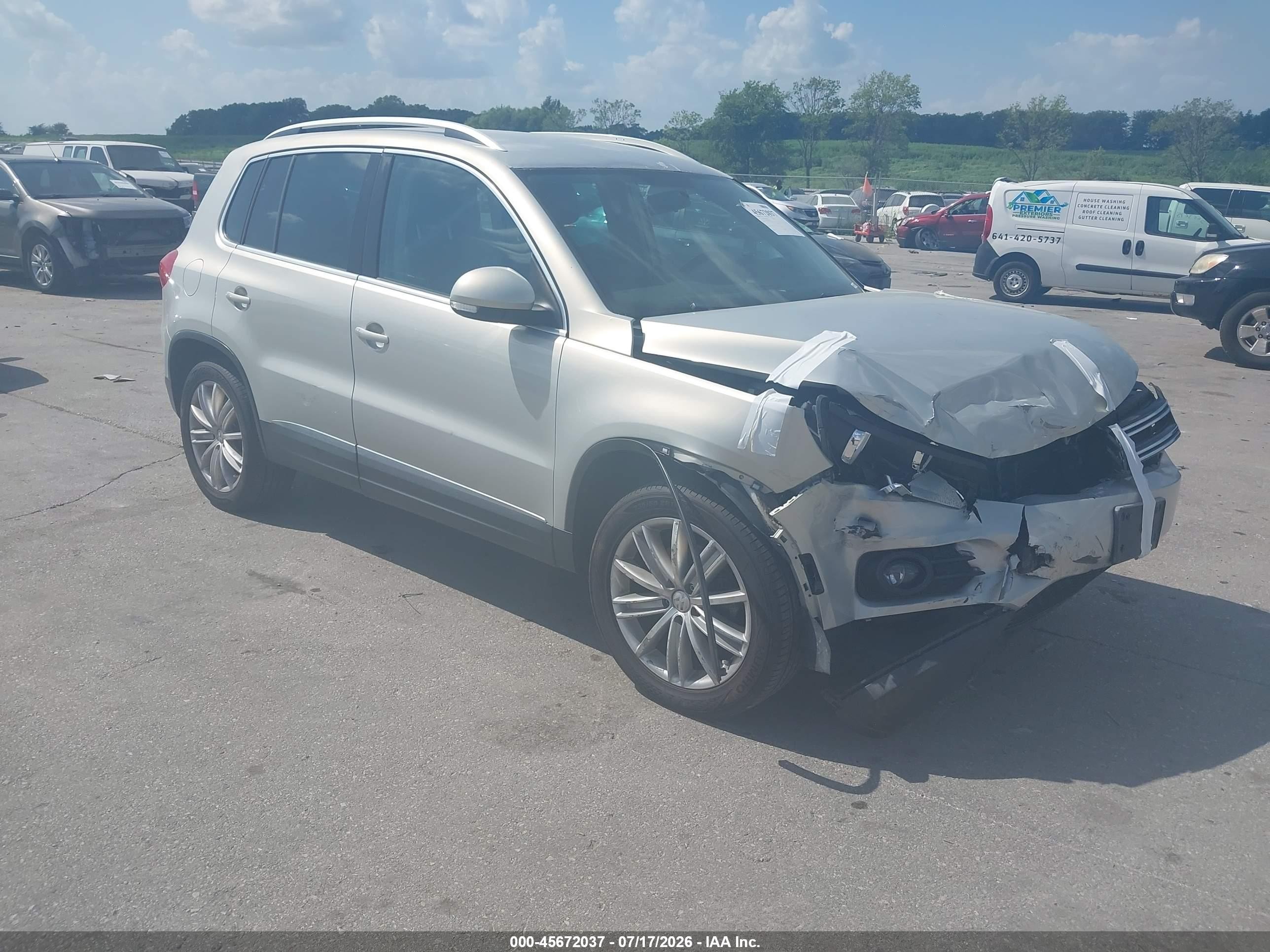 2013 Volkswagen Tiguan S, VIN WVGBV3AX9DW566728 — Front end