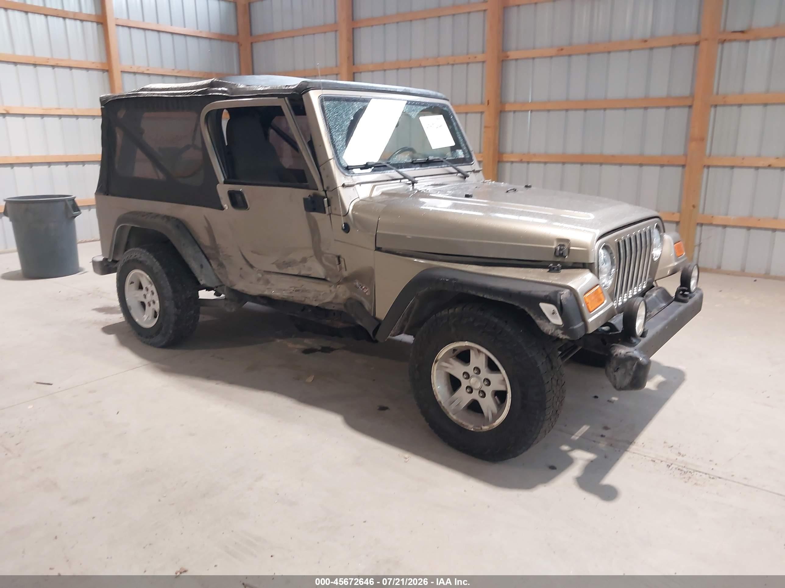 2005 Jeep Wrangler Unlimited, VIN 1J4FA44S05P320034 — Side