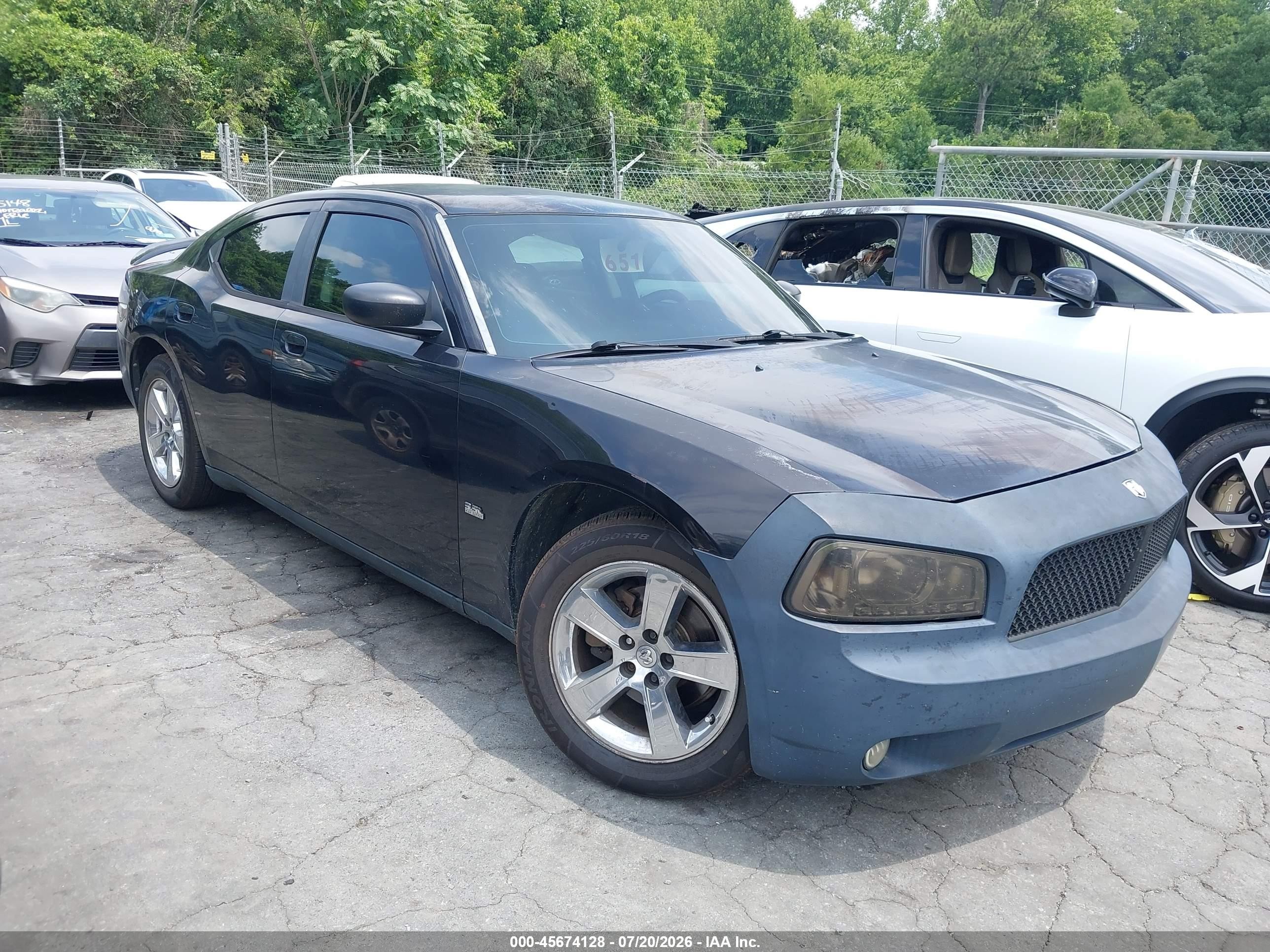 2009 Dodge Charger SXT, VIN 2B3KA33V29H506504 — Зад