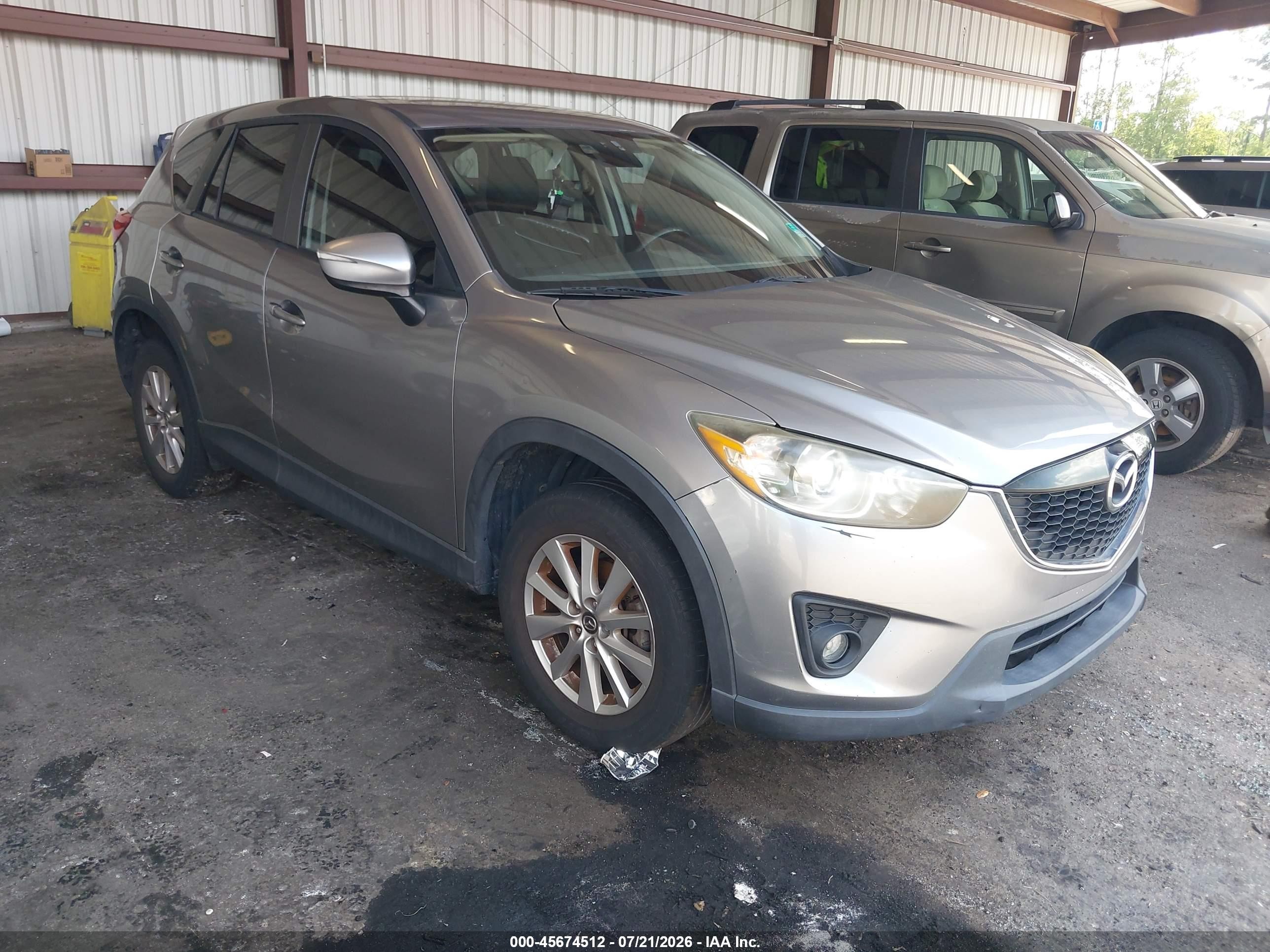 2015 Mazda CX-5 Touring, VIN JM3KE2CY9F0510497 — Обычный износ
