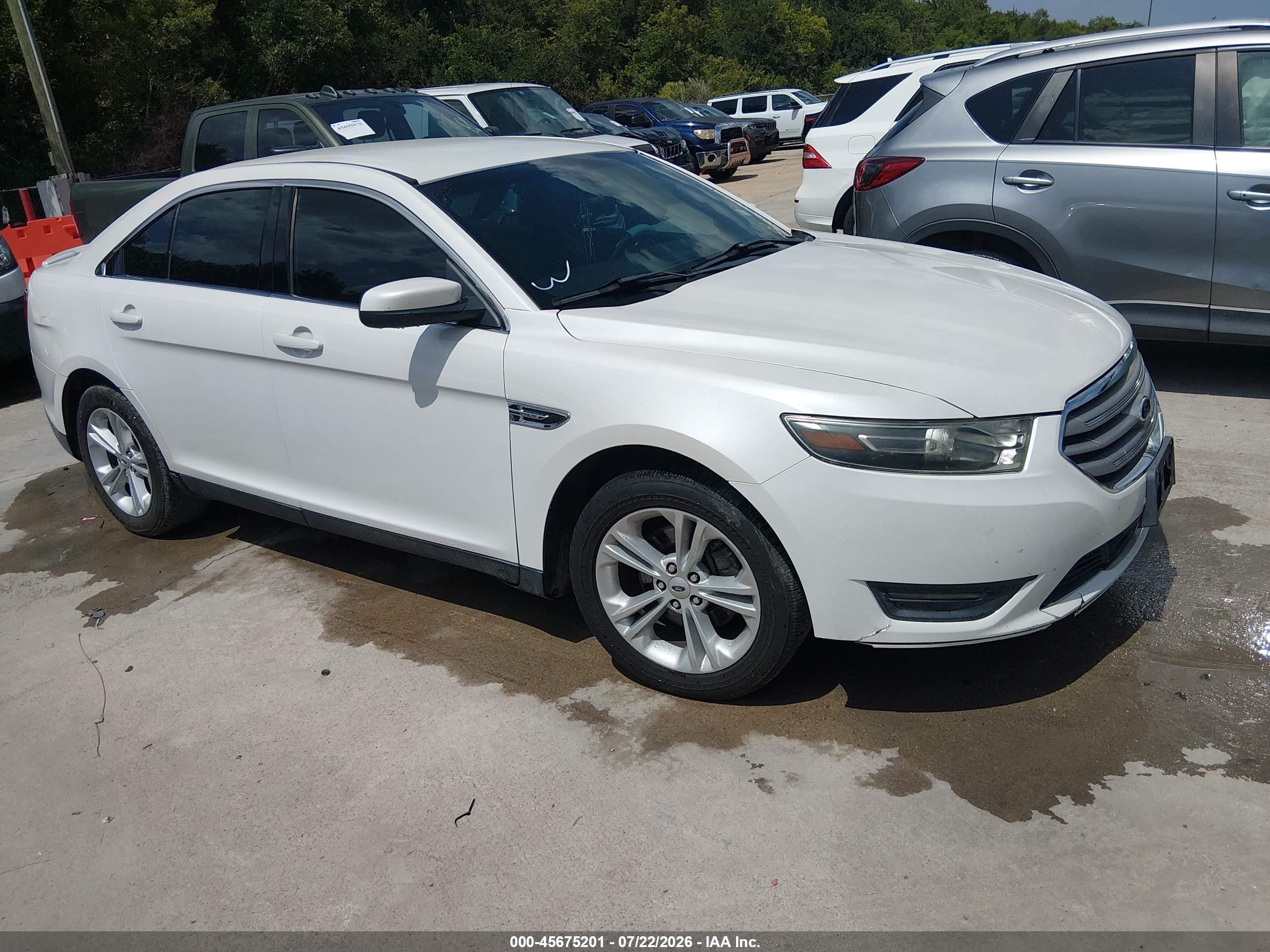 2014 Ford Taurus SEL, VIN 1FAHP2E82EG182054 — Repossession