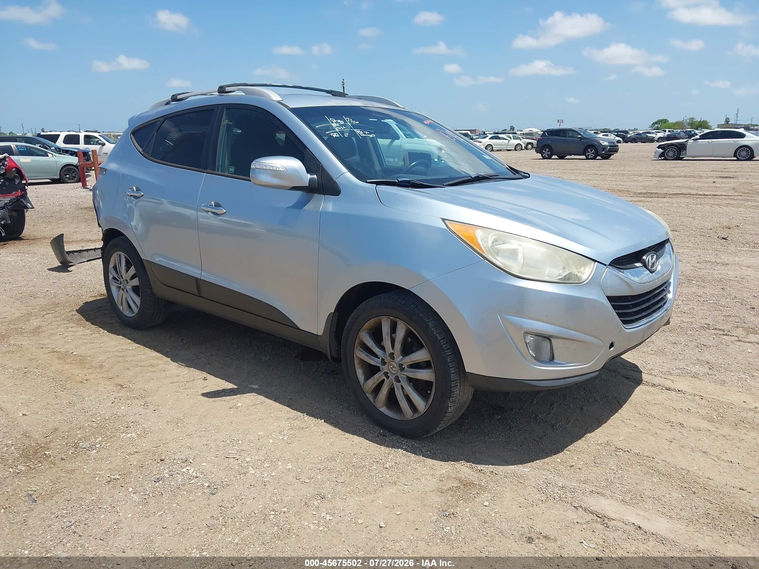 2012 Hyundai Tucson GLS, VIN KM8JU3AC8CU482633 — Rear end