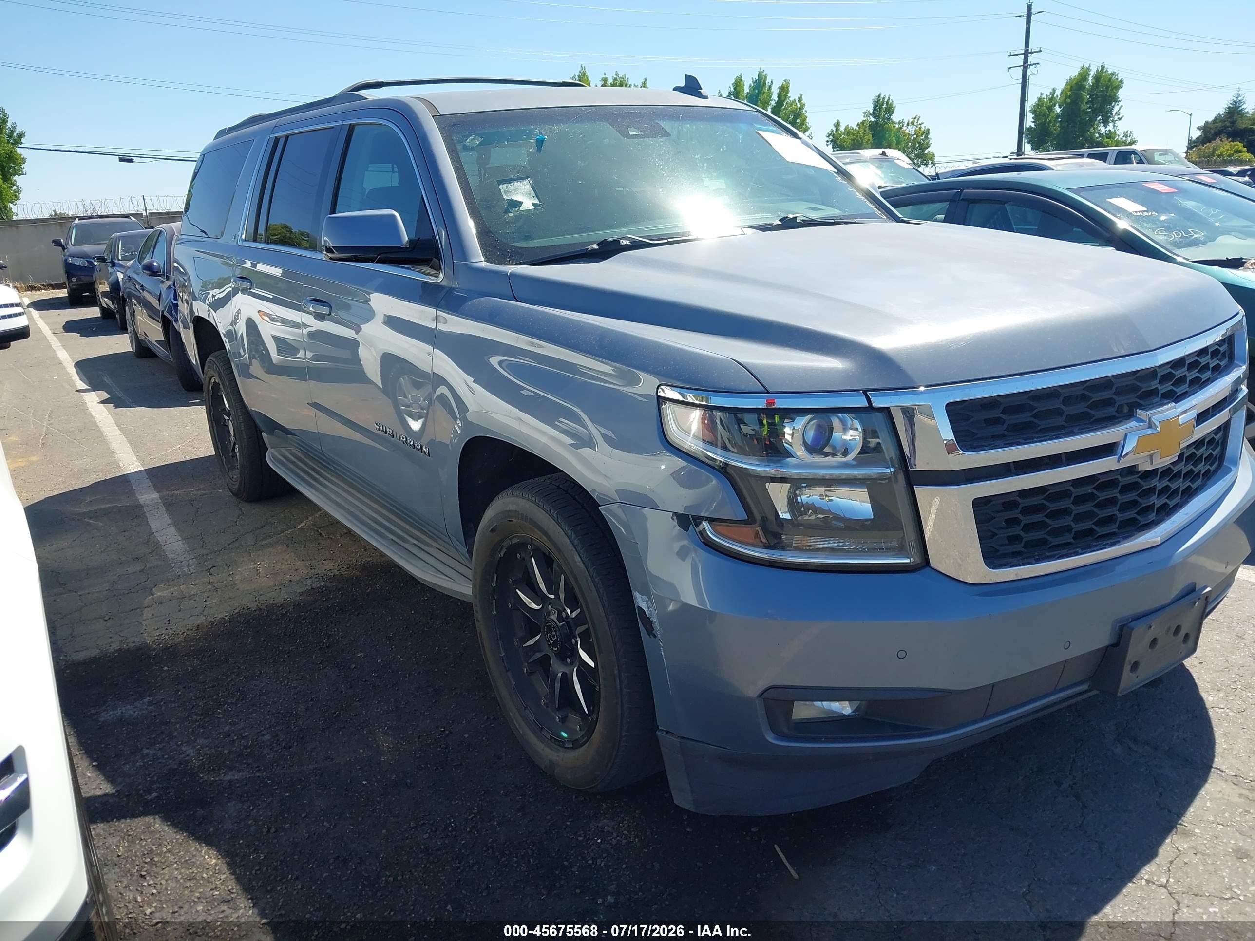 2016 Chevrolet Suburban LT, VIN 1GNSCHKC0GR228440 — Front end