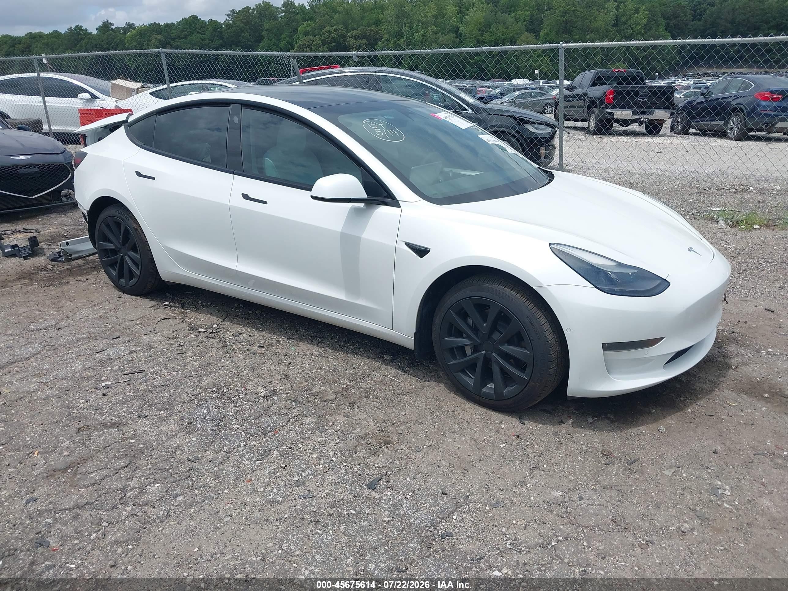 2022 Tesla Model 3 Long Range, VIN 5YJ3E1EB4NF271019 — Rear end