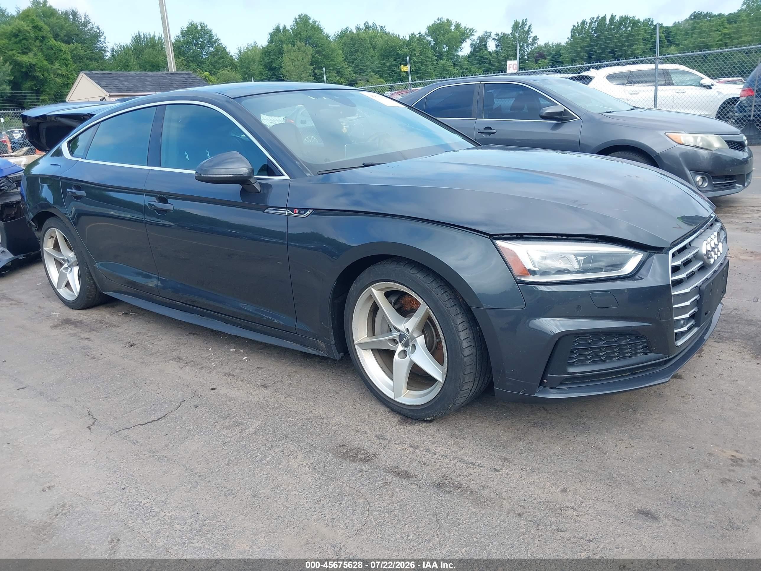 2018 Audi A5 Sportback Premium Plus, VIN WAUENCF51JA060308 — Зад