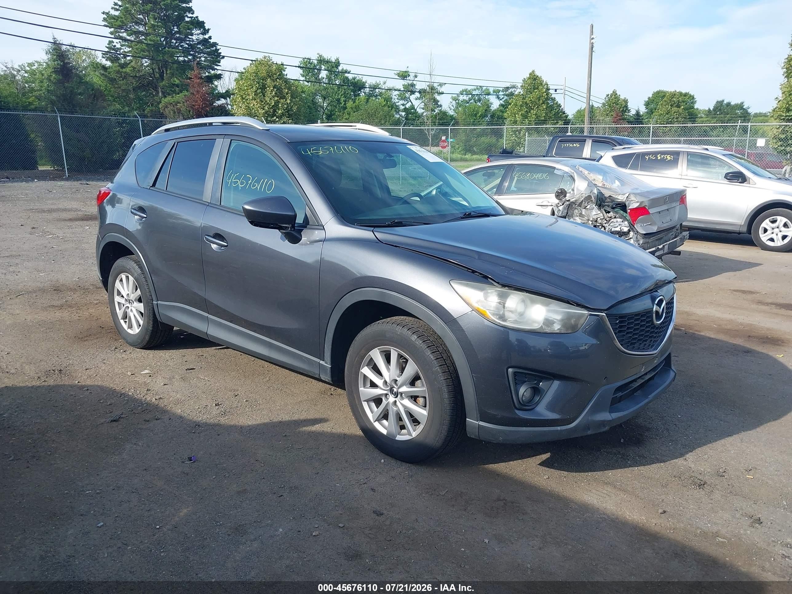 2014 Mazda CX-5 Touring, VIN JM3KE4CY0E0430662 — Rear end