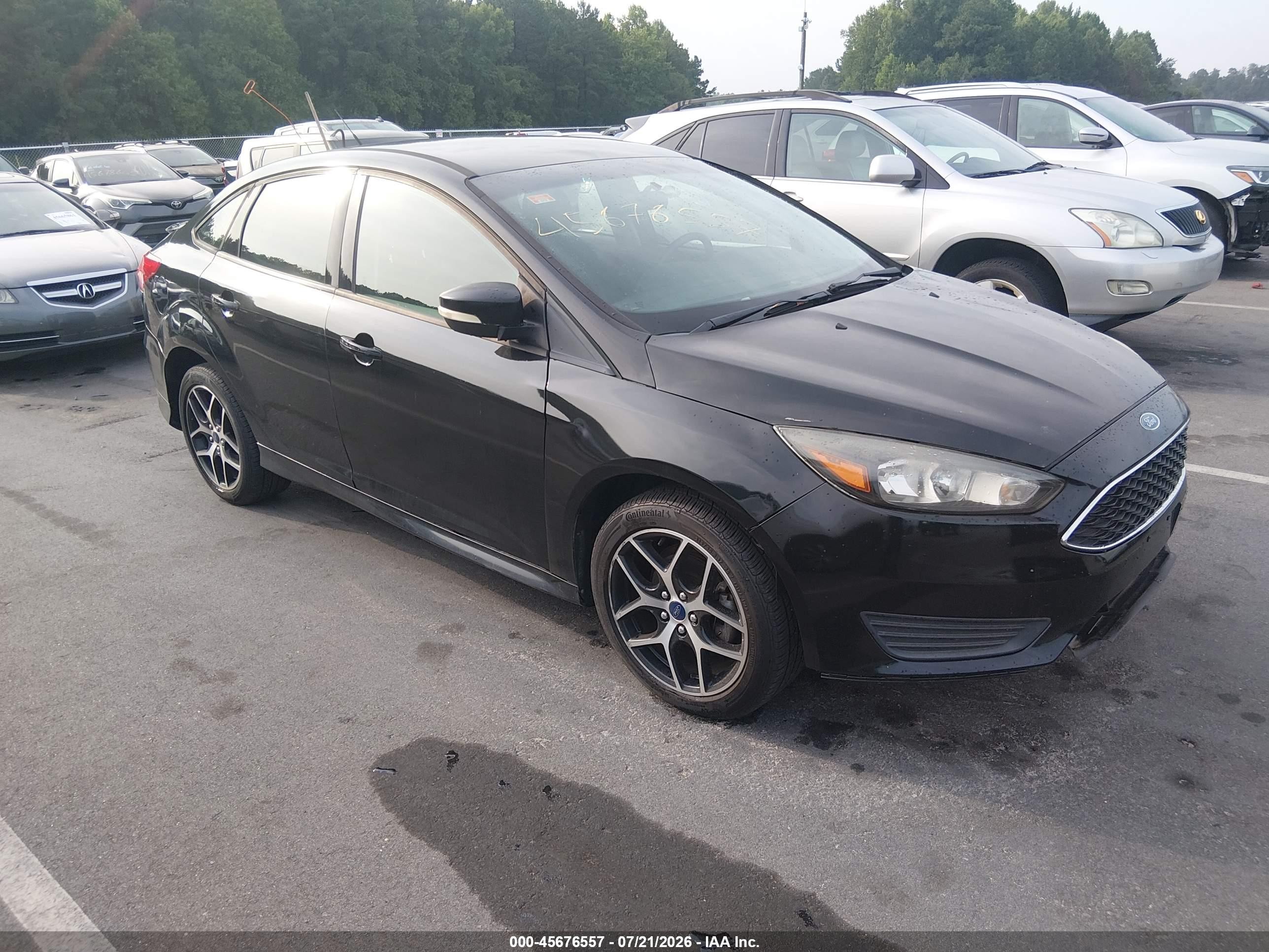 2015 Ford Focus SE, VIN 1FADP3F22FL360519 — Normal wear
