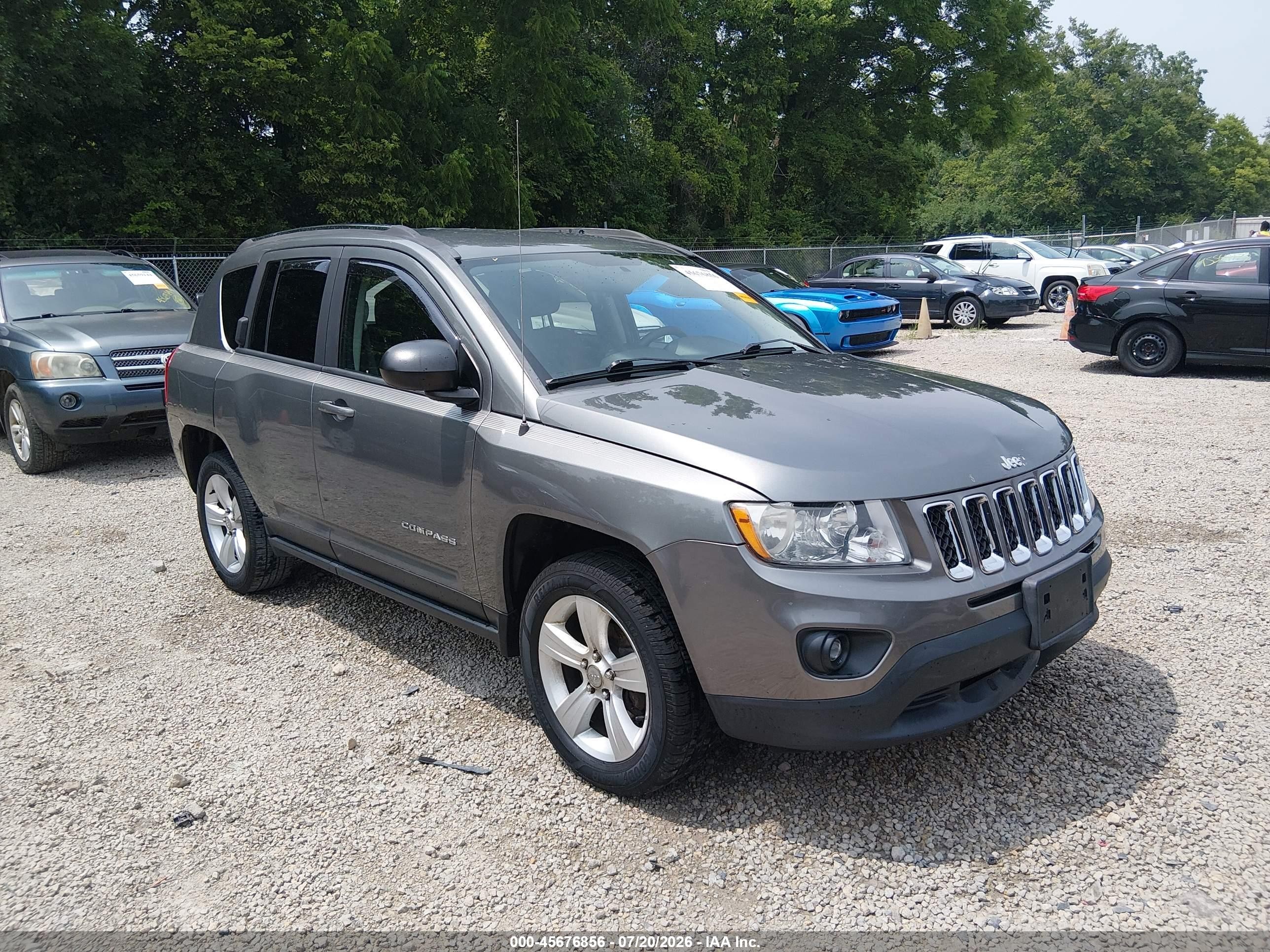2013 Jeep Compass Sport, VIN 1C4NJDBB9DD210524 — Rear end