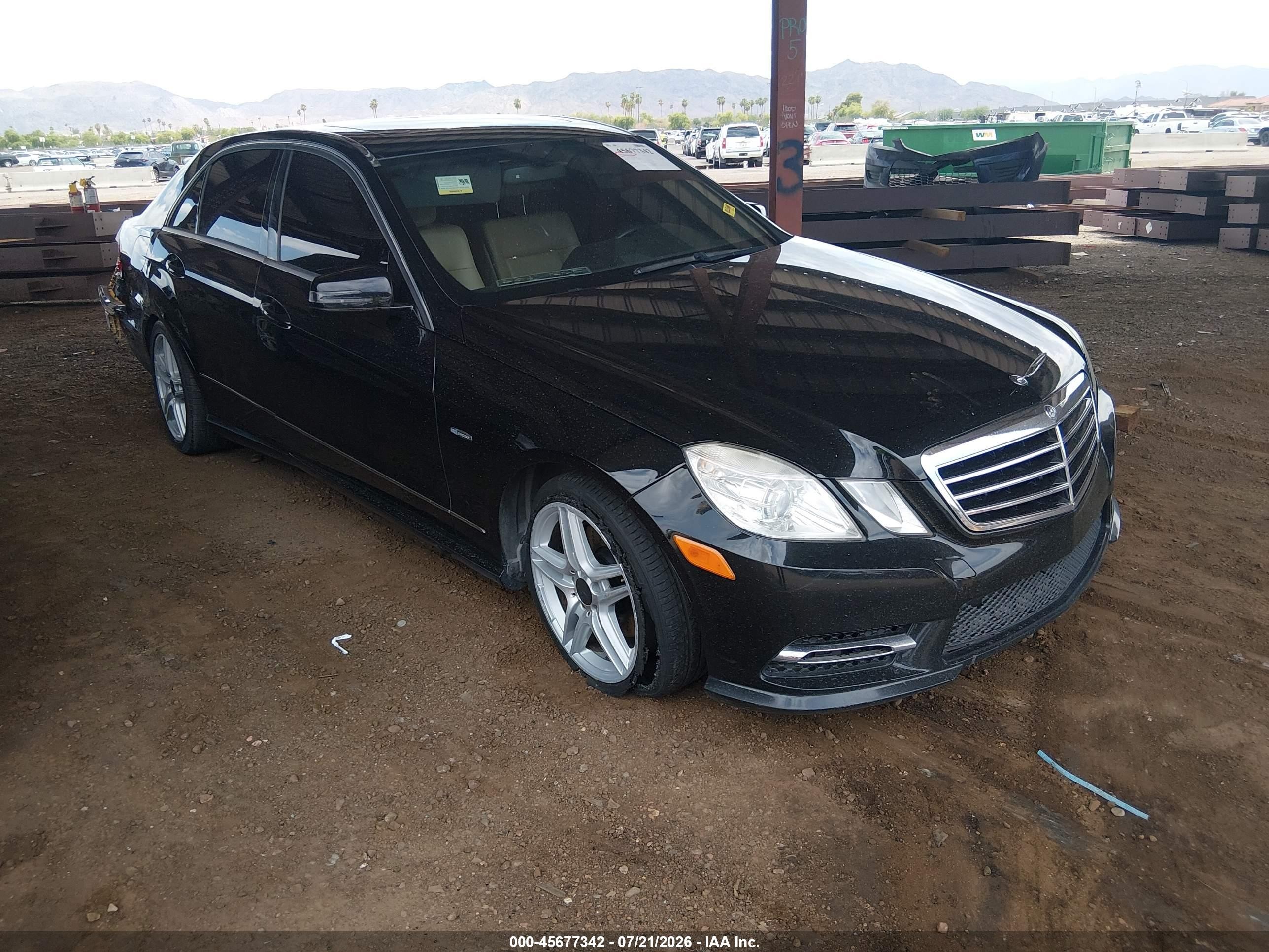 2012 Mercedes-Benz E 350 Luxury, VIN WDDHF5KB3CA585982 — Rear end