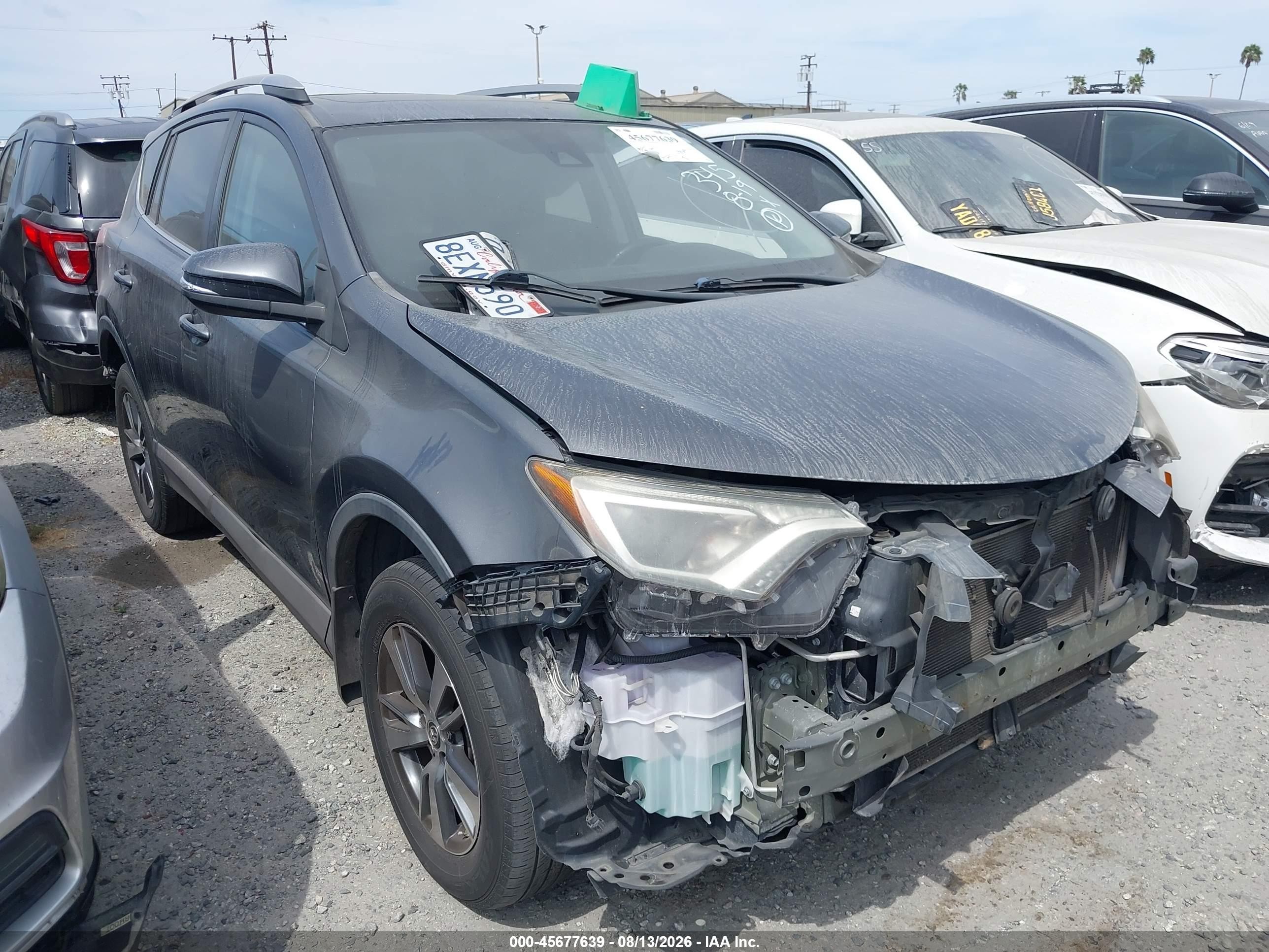 2018 Toyota RAV4 XLE, VIN 2T3WFREV0JW482581 — Rear end