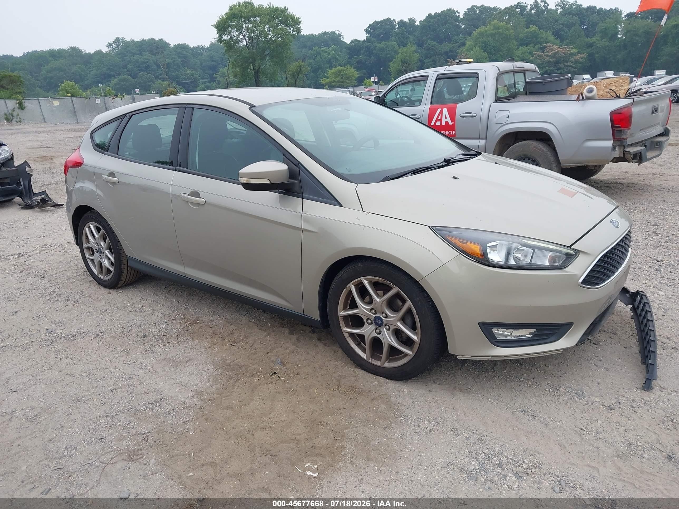 2015 Ford Focus SE, VIN 1FADP3K2XFL284019 — Normal wear