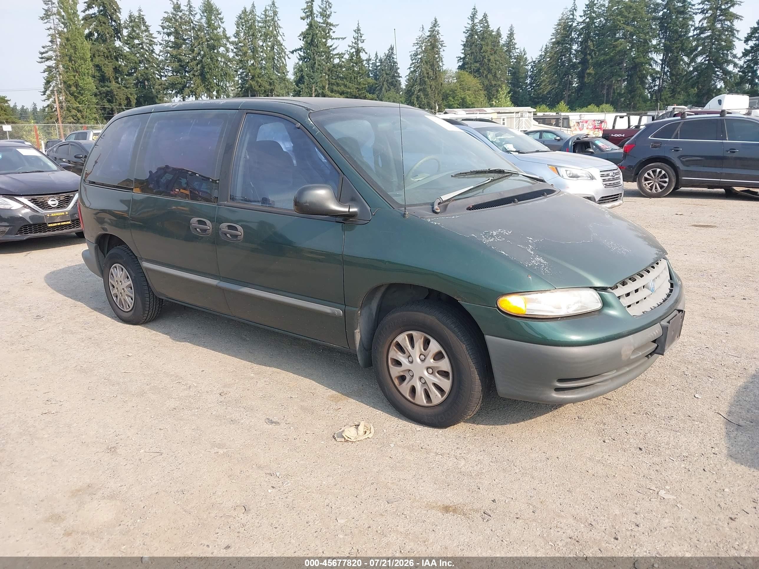 1999 Plymouth Voyager, VIN 2P4FP25B7XR214717 — Normal wear