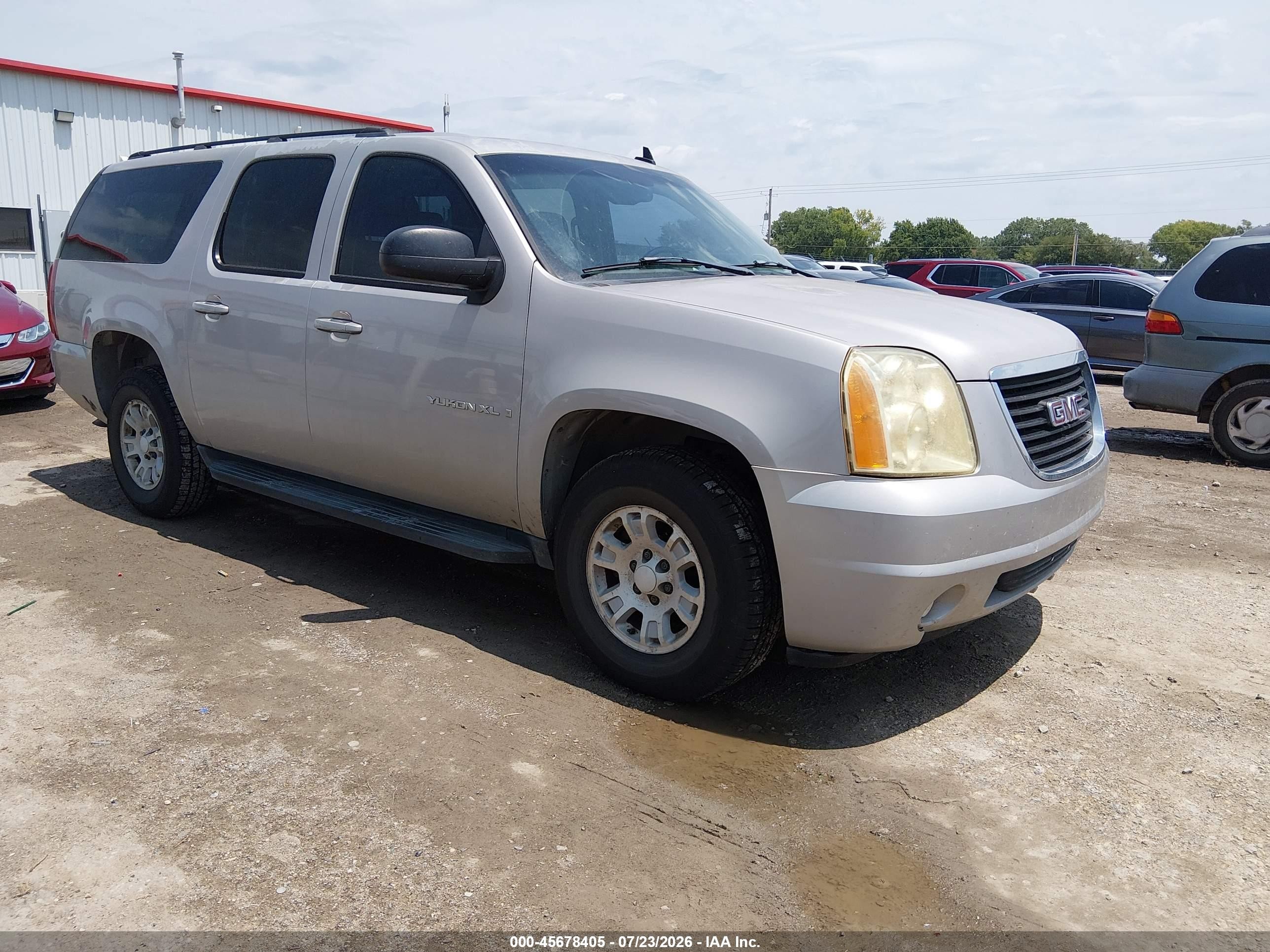 2007 GMC Yukon XL SLT, VIN 1GKFK16387J176105 — Бок