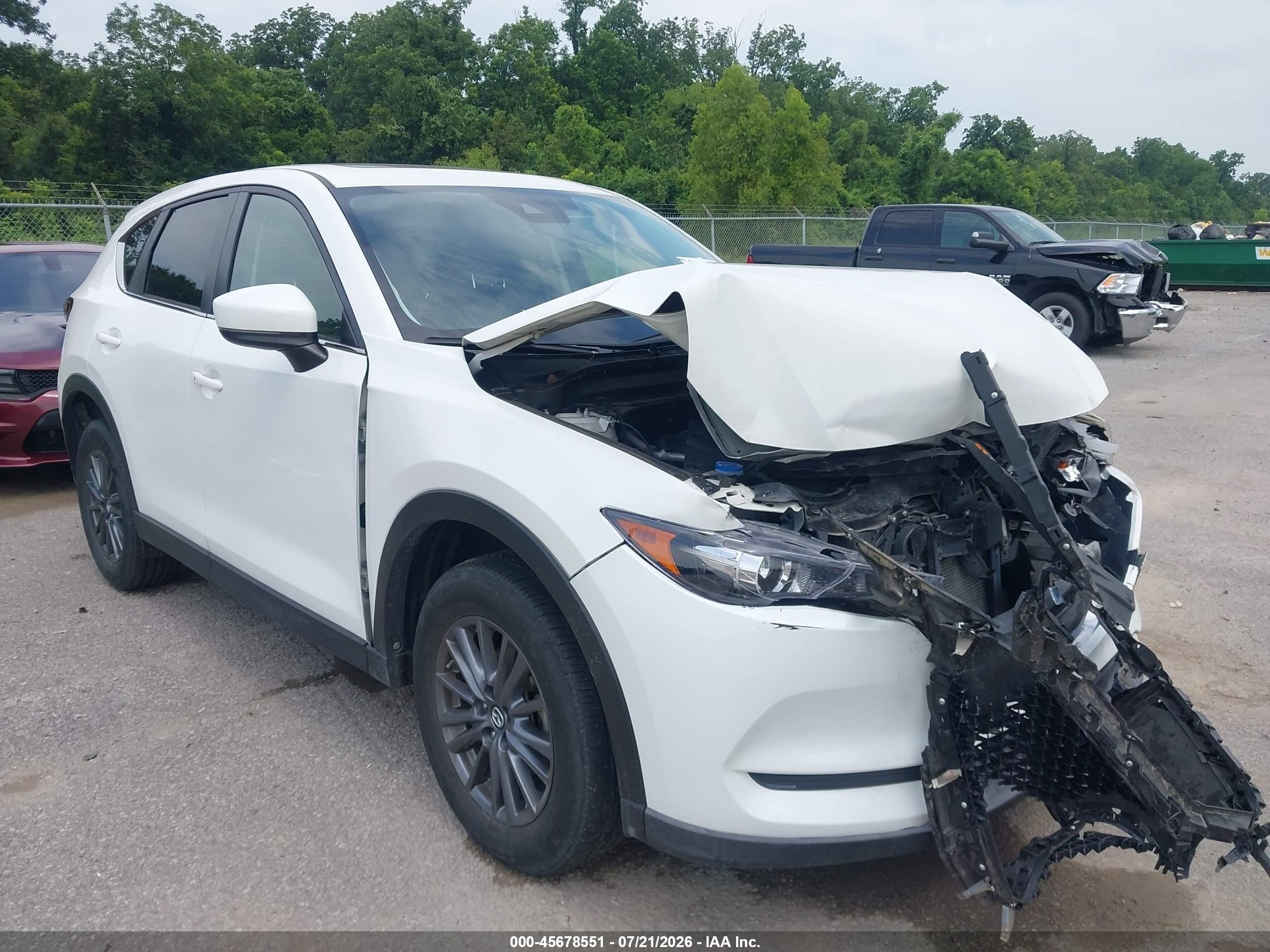 2020 Mazda CX-5 Touring, VIN JM3KFACM9L0723515 — Front end