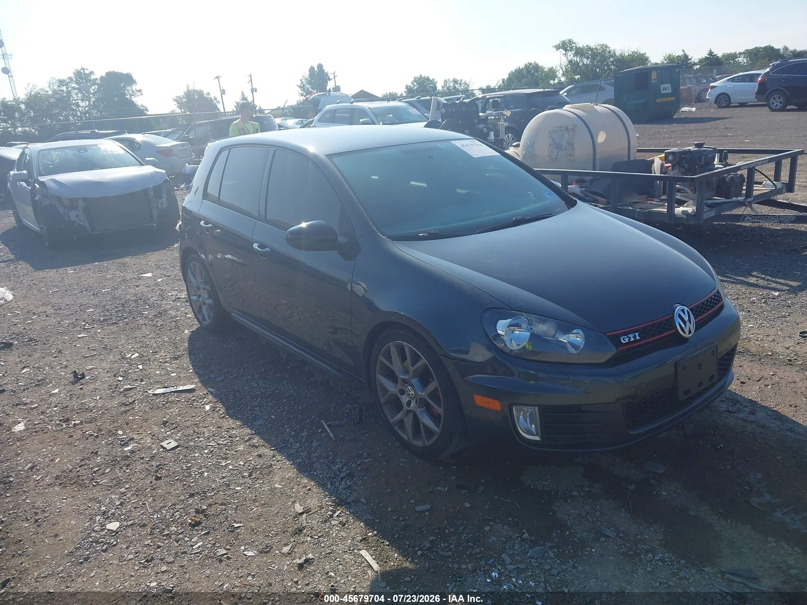 2014 Volkswagen Golf GTI Wolfsburg Edition, VIN WVWHD7AJ8EW011484 — Rear end