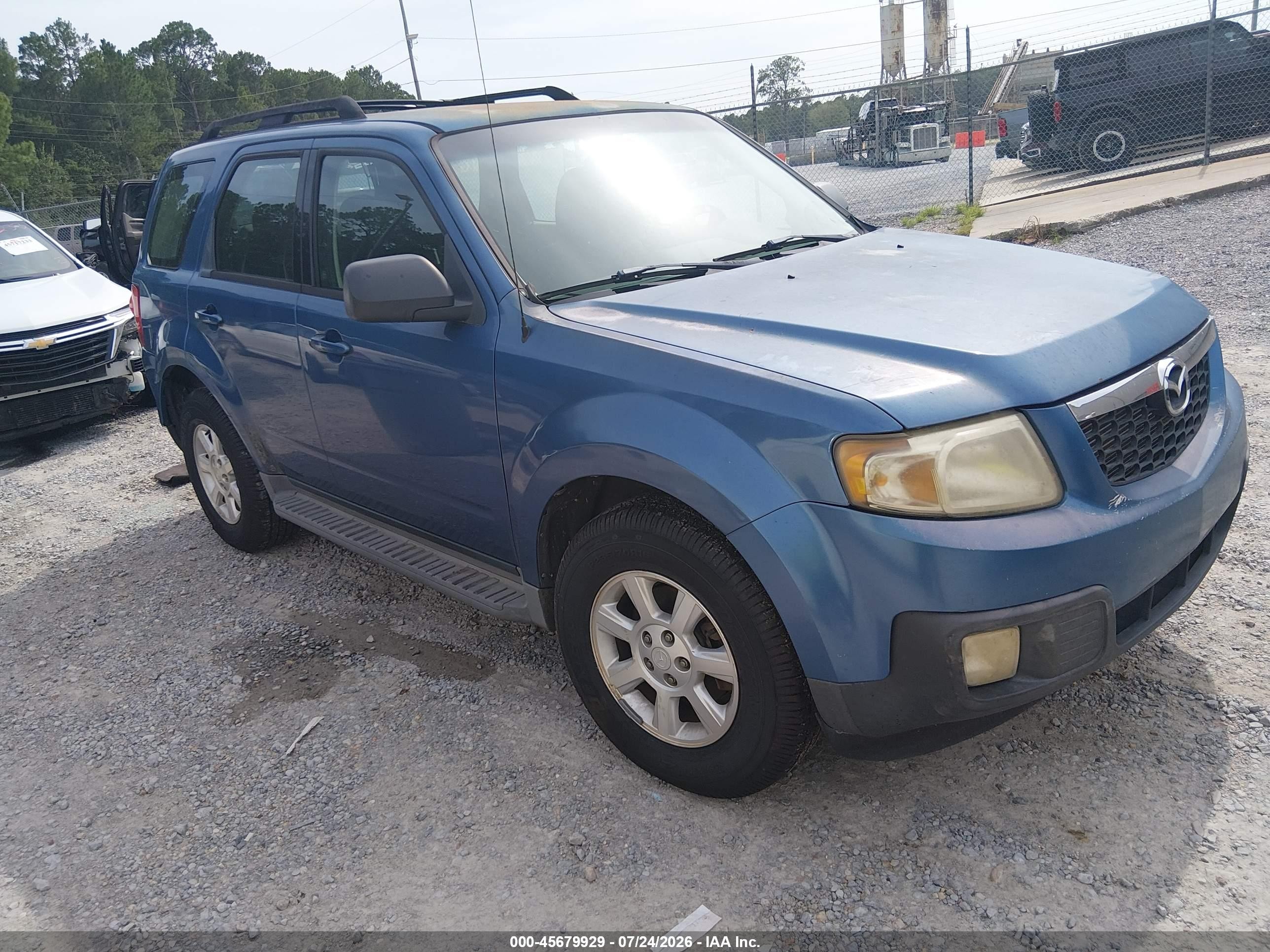 2009 Mazda Tribute Sport, VIN 4F2CZ02749KM07642 — Обычный износ