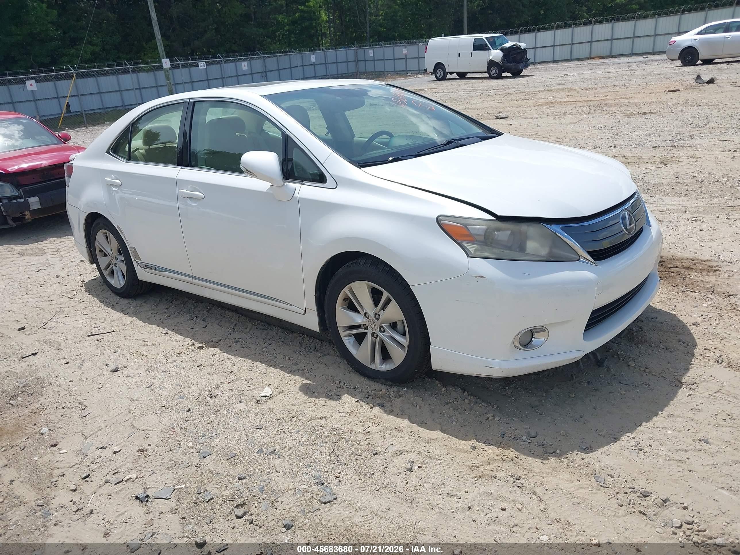 2010 Lexus HS 250h Premium, VIN JTHBB1BA7A2023021 — Normal wear