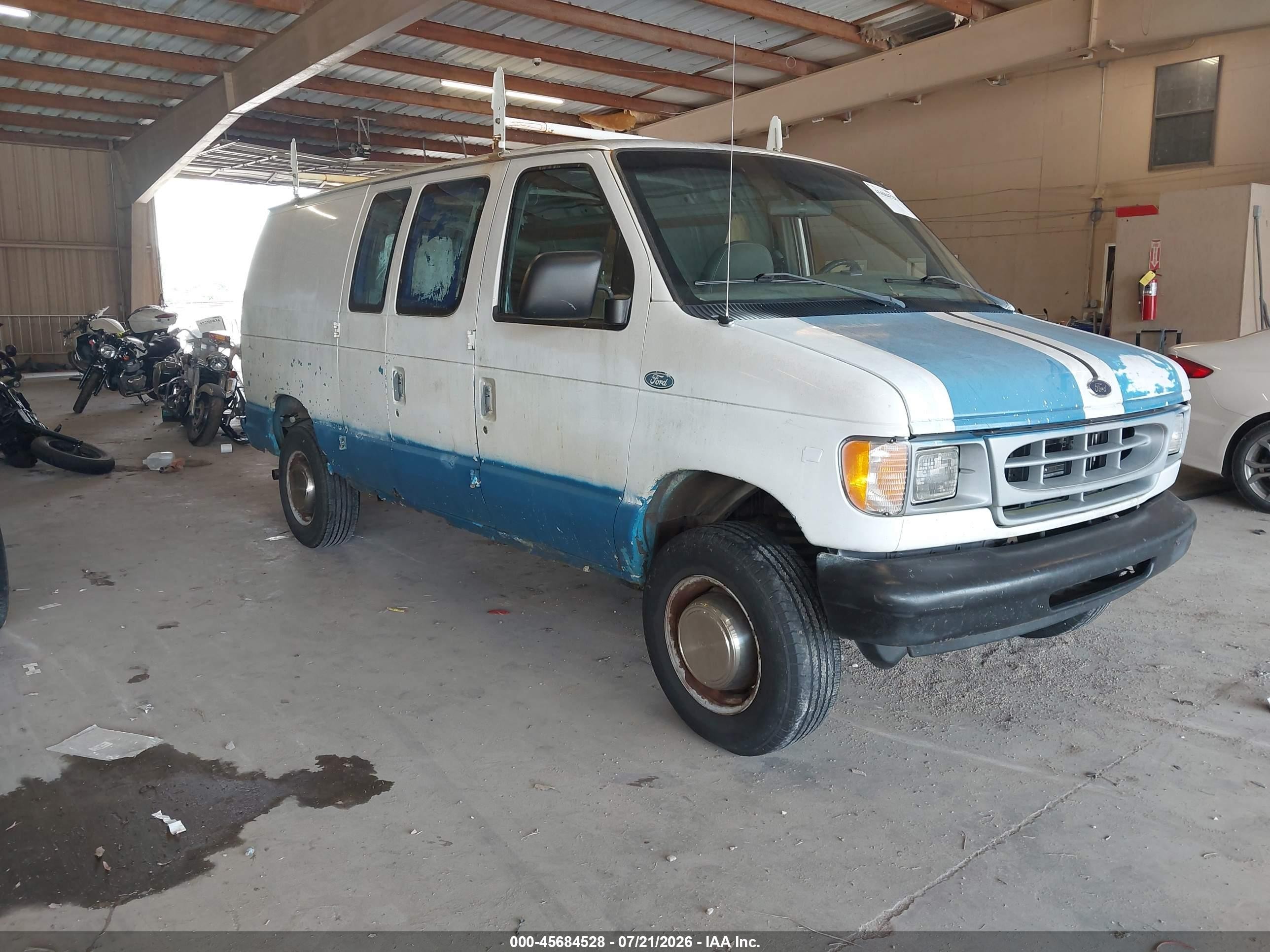 1999 Ford Econoline Cargo, VIN 1FTNE24L8XHC02801 — Normal wear