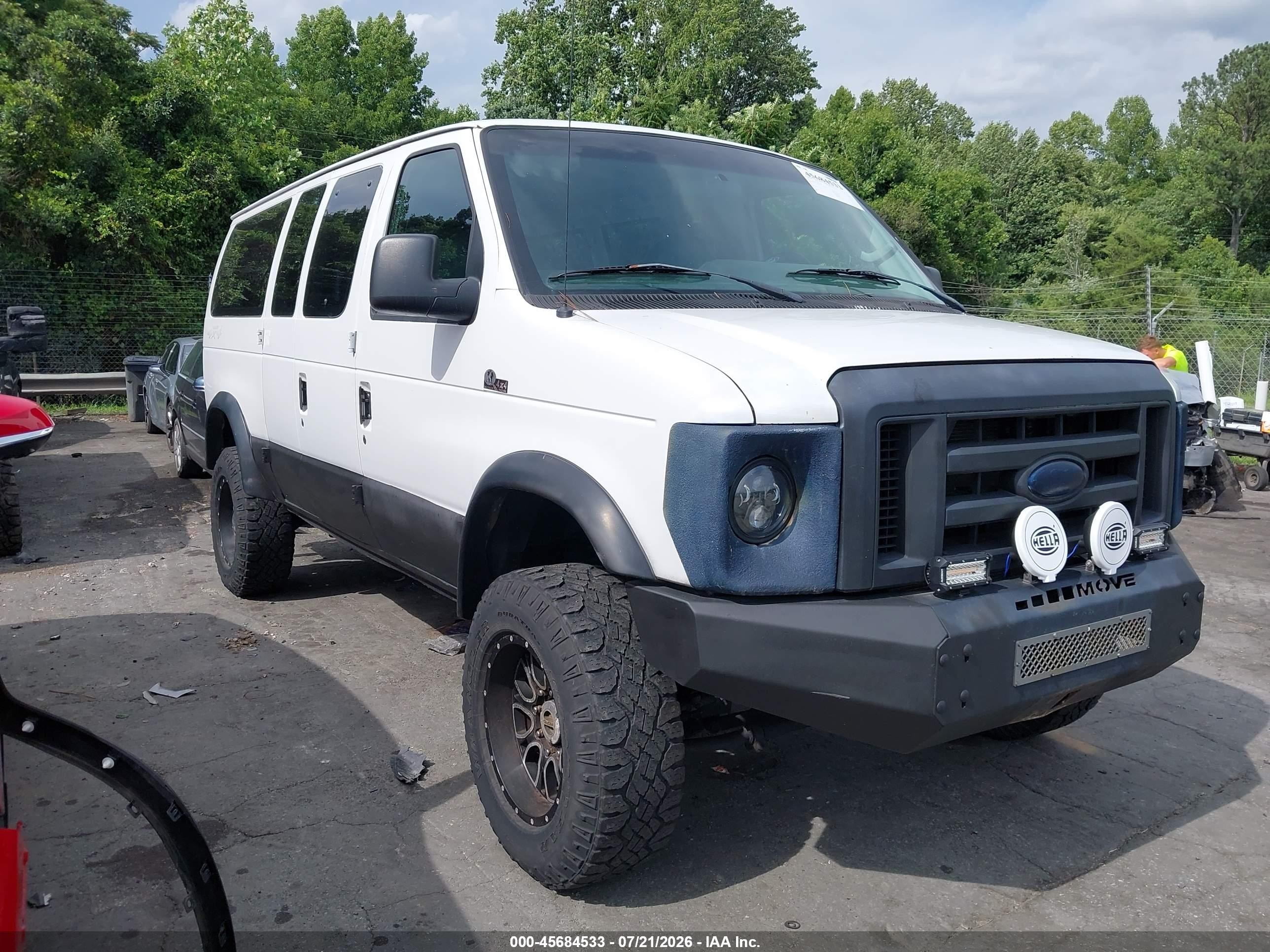 2011 Ford Econoline Passenger XLT, VIN 1FBNE3BL3BDB07494 — Rear end