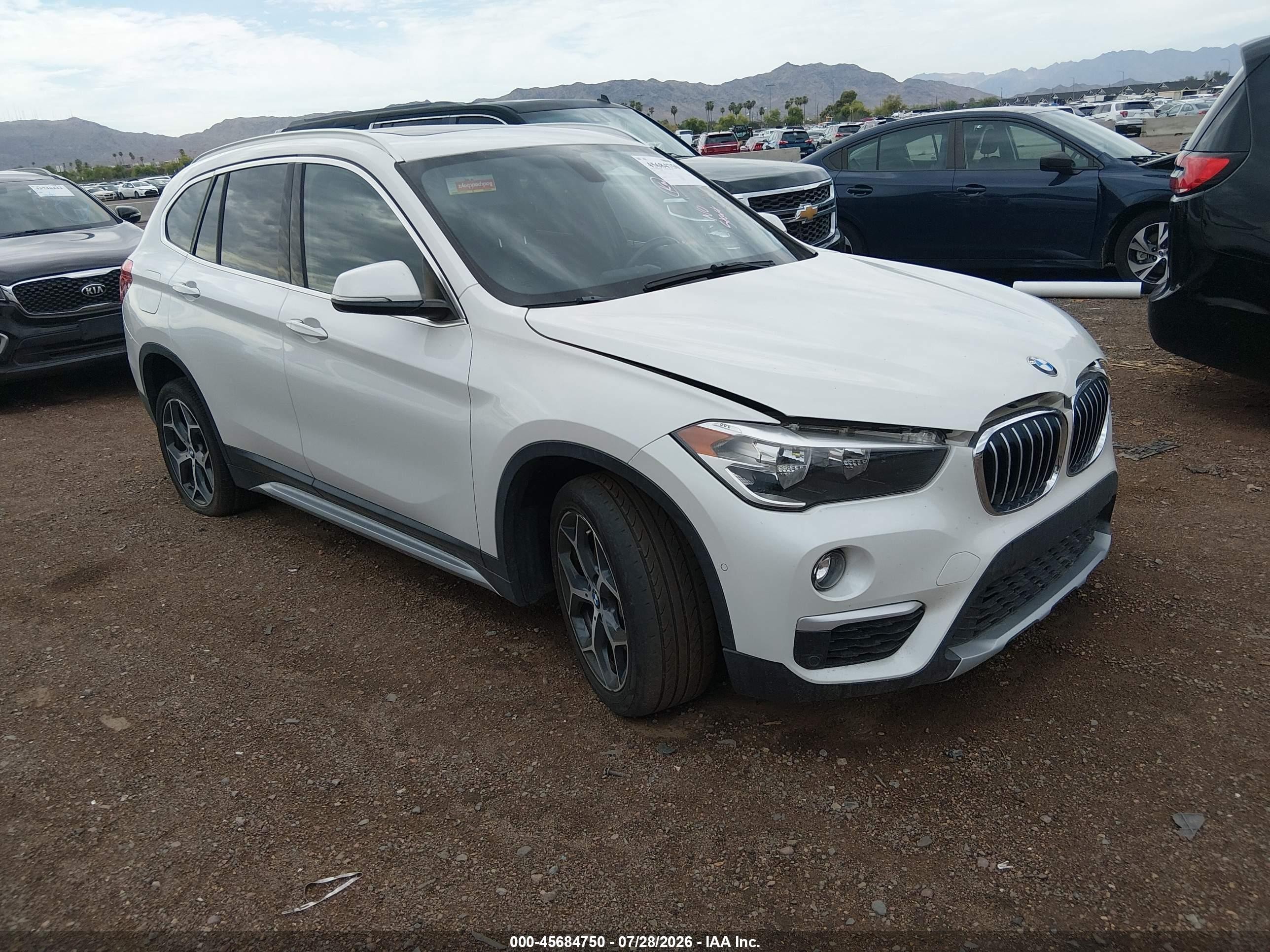 2018 BMW X1 xDrive28i, VIN WBXHT3C36J5K23510 — Front end