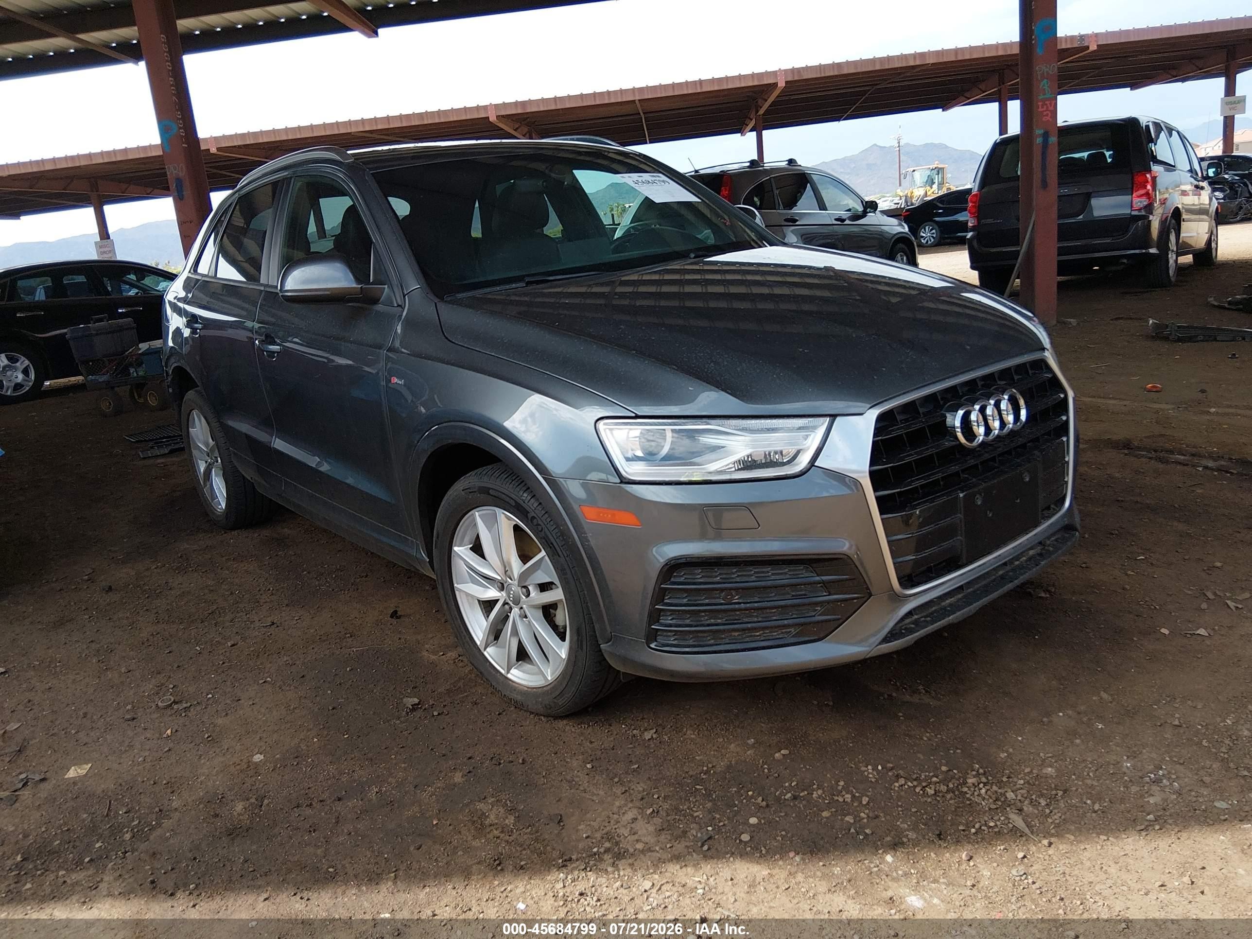 2018 Audi Q3 Premium, VIN WA1BCCFSXJR021102 — Rear end