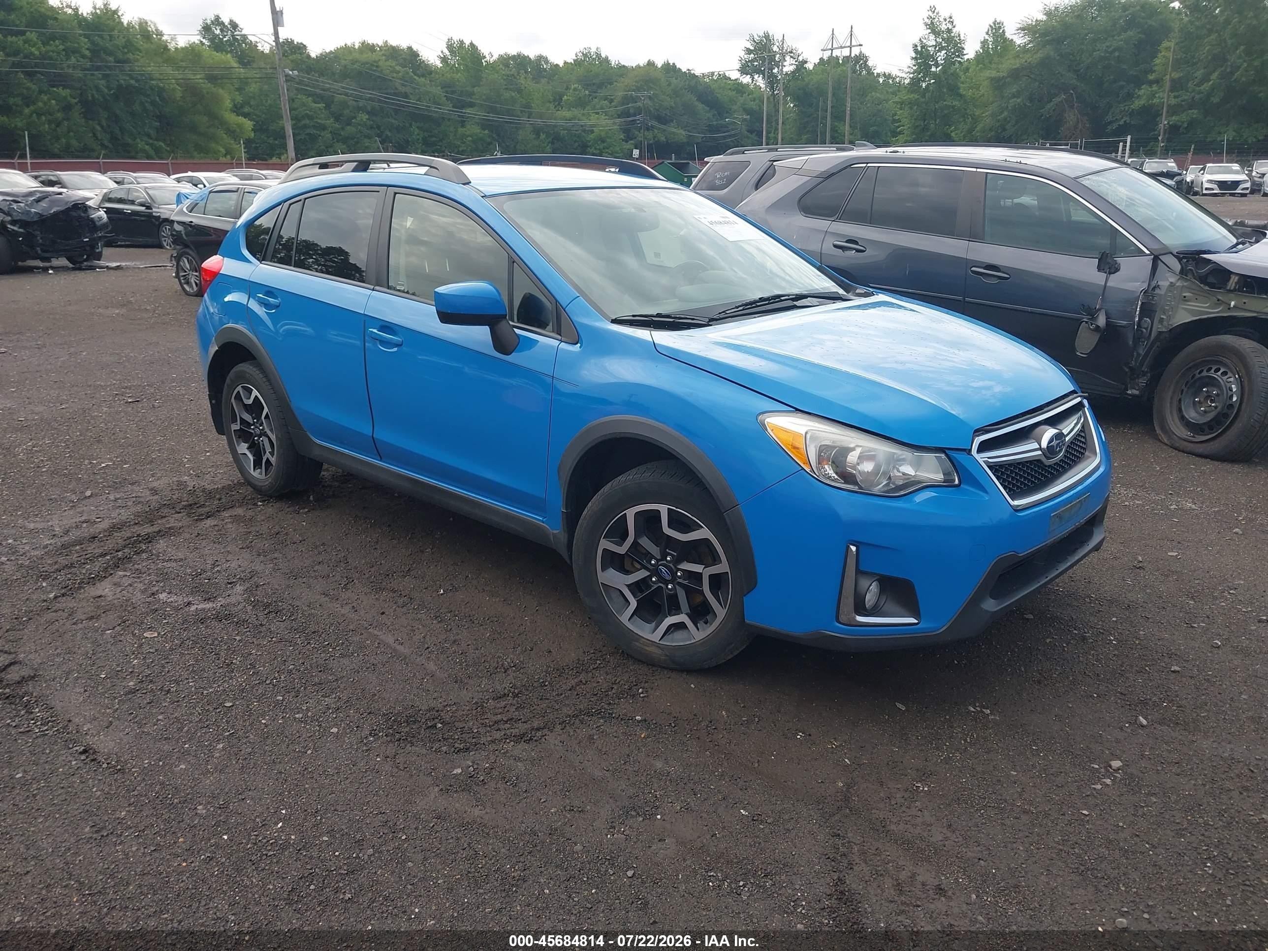 2016 Subaru Crosstrek Premium, VIN JF2GPABC6G8329032 — Бок
