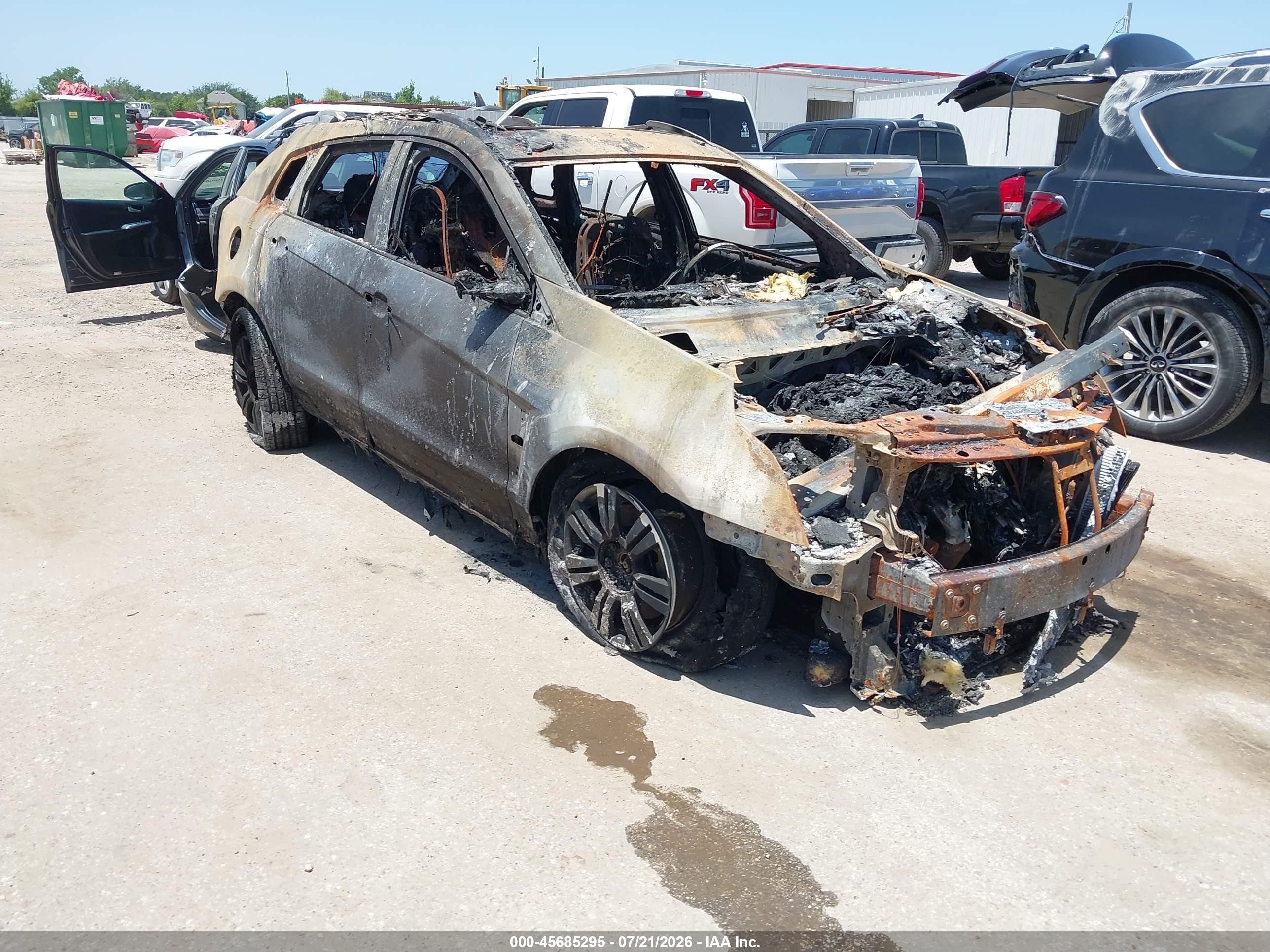 2015 Cadillac SRX Luxury Collection, VIN 3GYFNBE33FS599840 — Burn