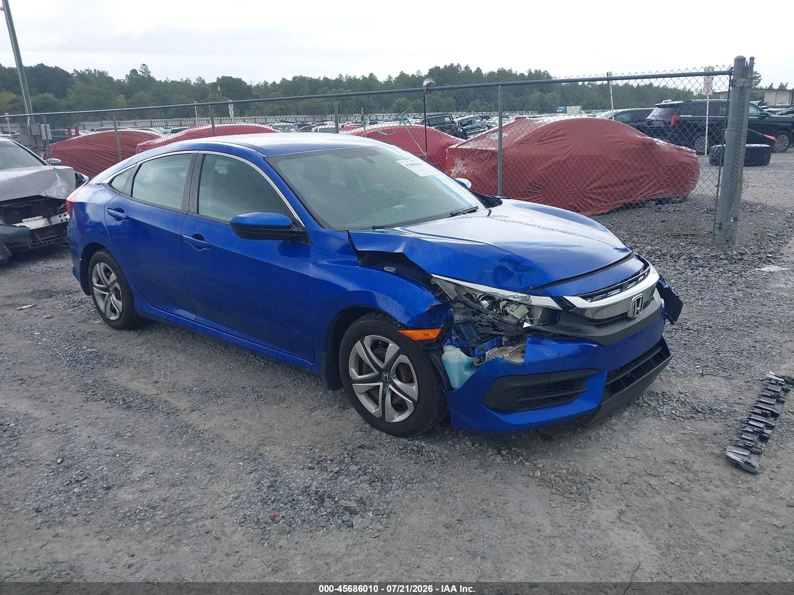 2018 Honda Civic LX, VIN 19XFC2F59JE031434 — Front end