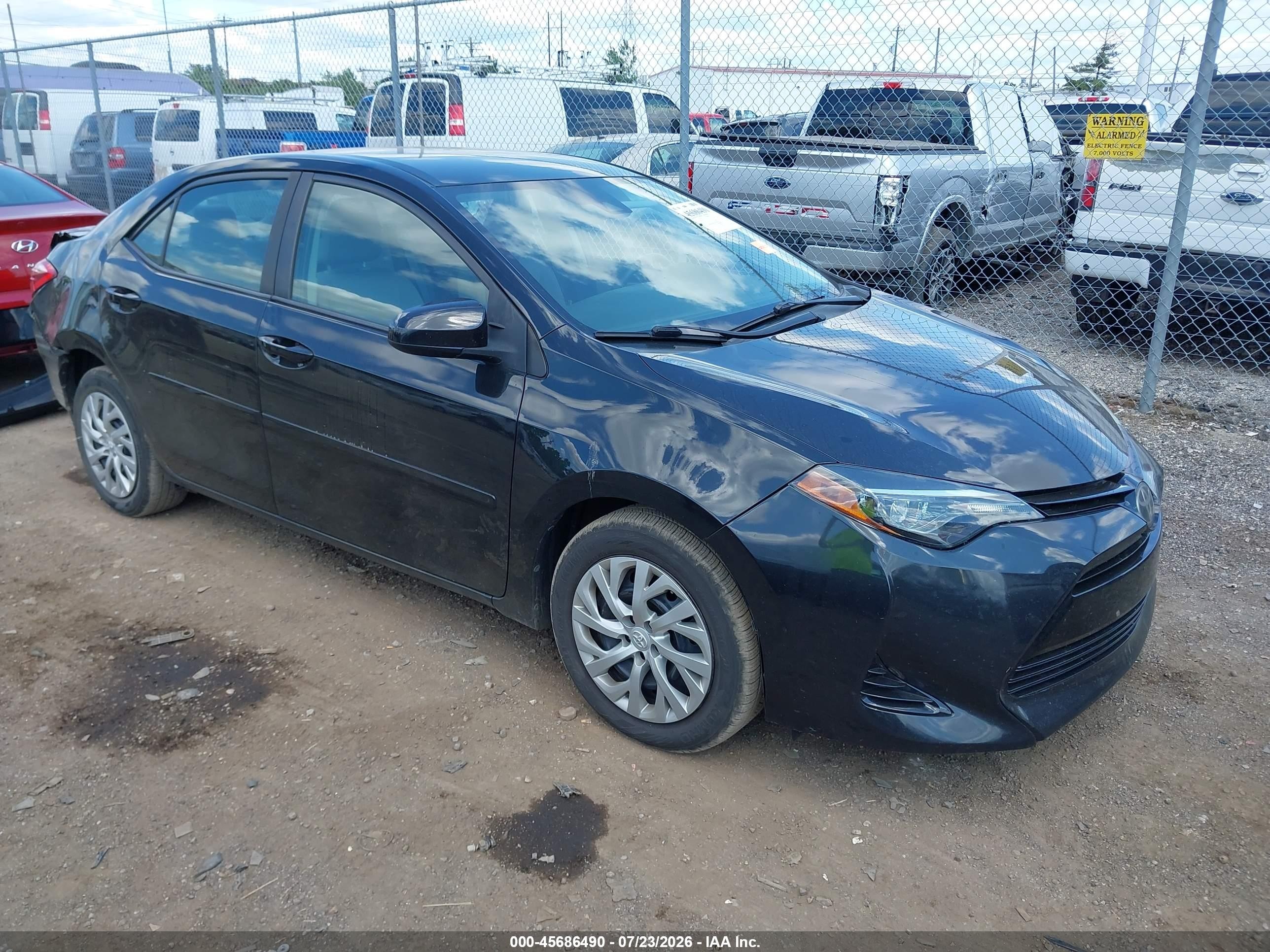 2018 Toyota Corolla LE, VIN 2T1BURHE9JC058634 — Зад