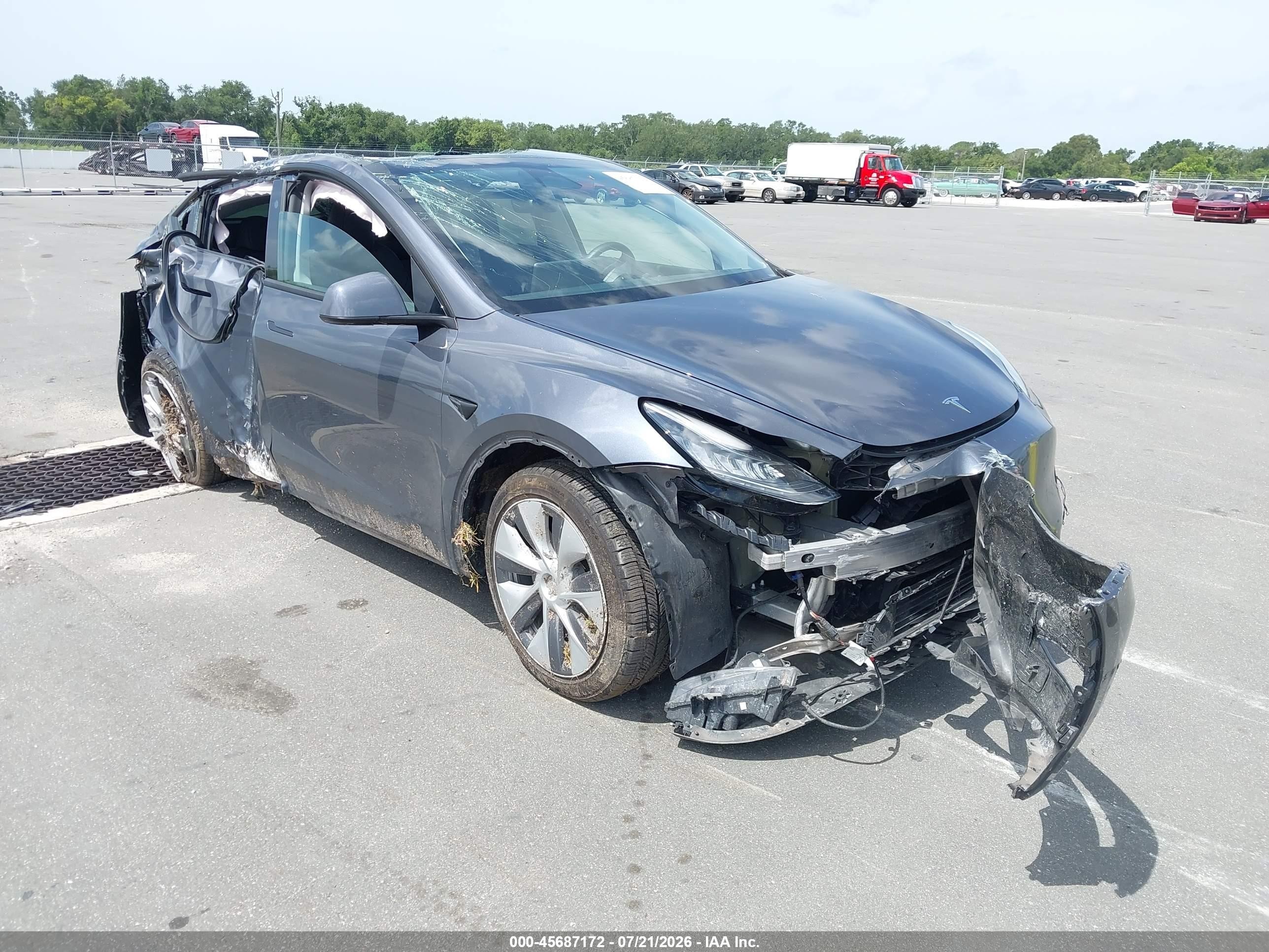2023 Tesla Model Y Long Range, VIN 7SAYGDEE1PA038858 — Rollover