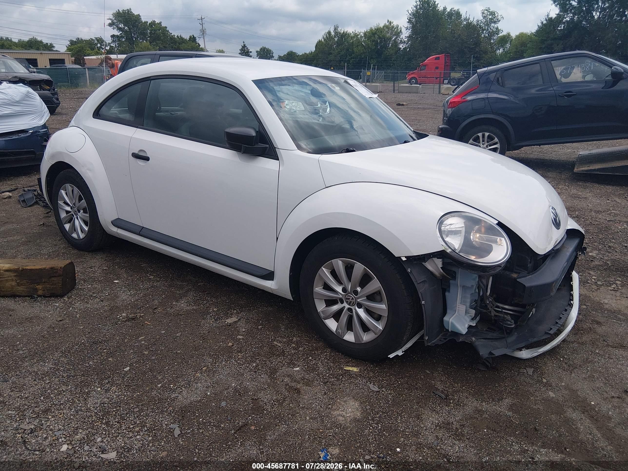 2015 Volkswagen Beetle 1.8T, VIN 3VWF17AT7FM640184 — Front end