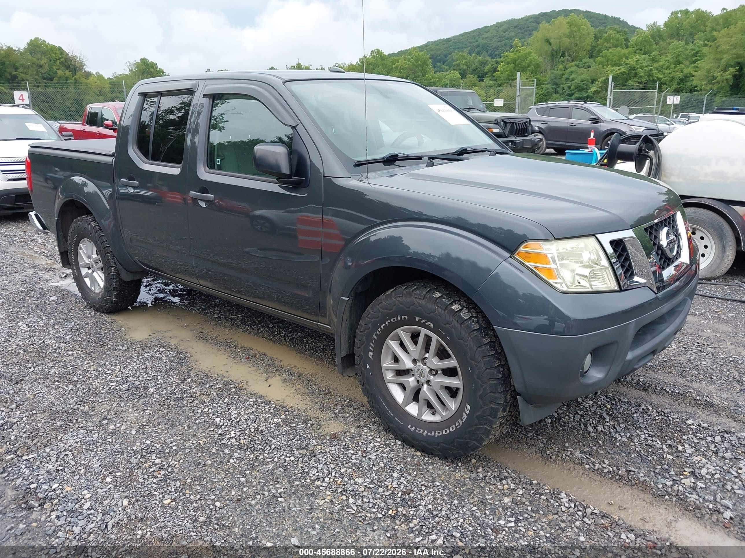 2014 Nissan Frontier Pro-4X, VIN 1N6AD0EV8EN705875 — Side