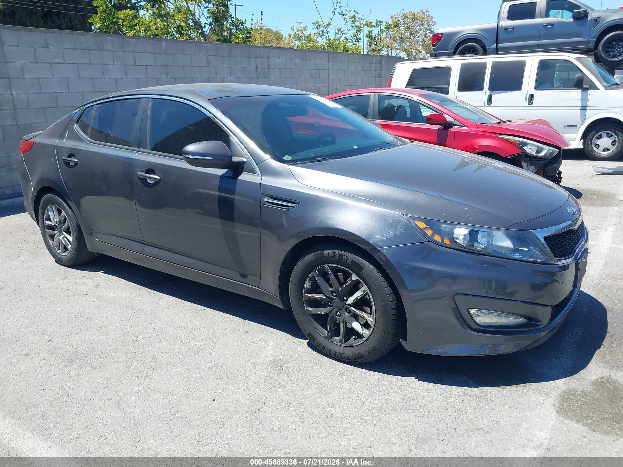 2011 Kia Optima LX, VIN KNAGM4A70B5117733 — Vandalism