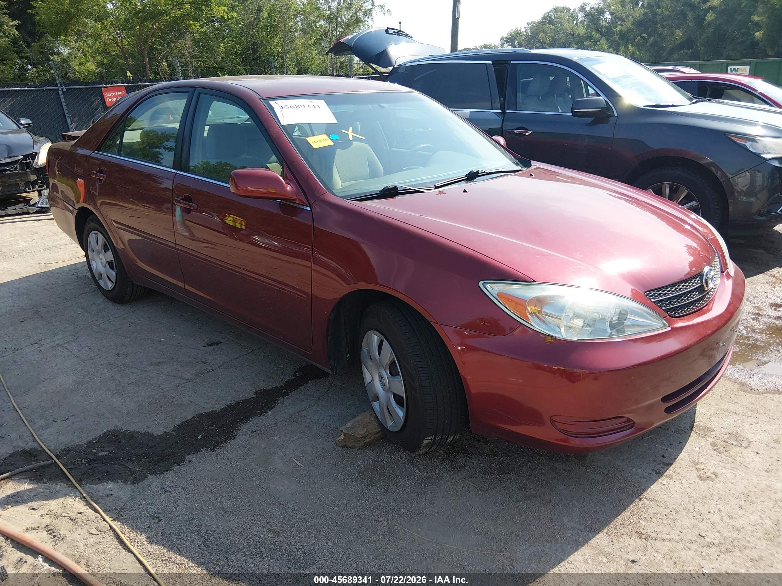 2003 Toyota Camry LE, VIN 4T1BE32KX3U241941 — Зад